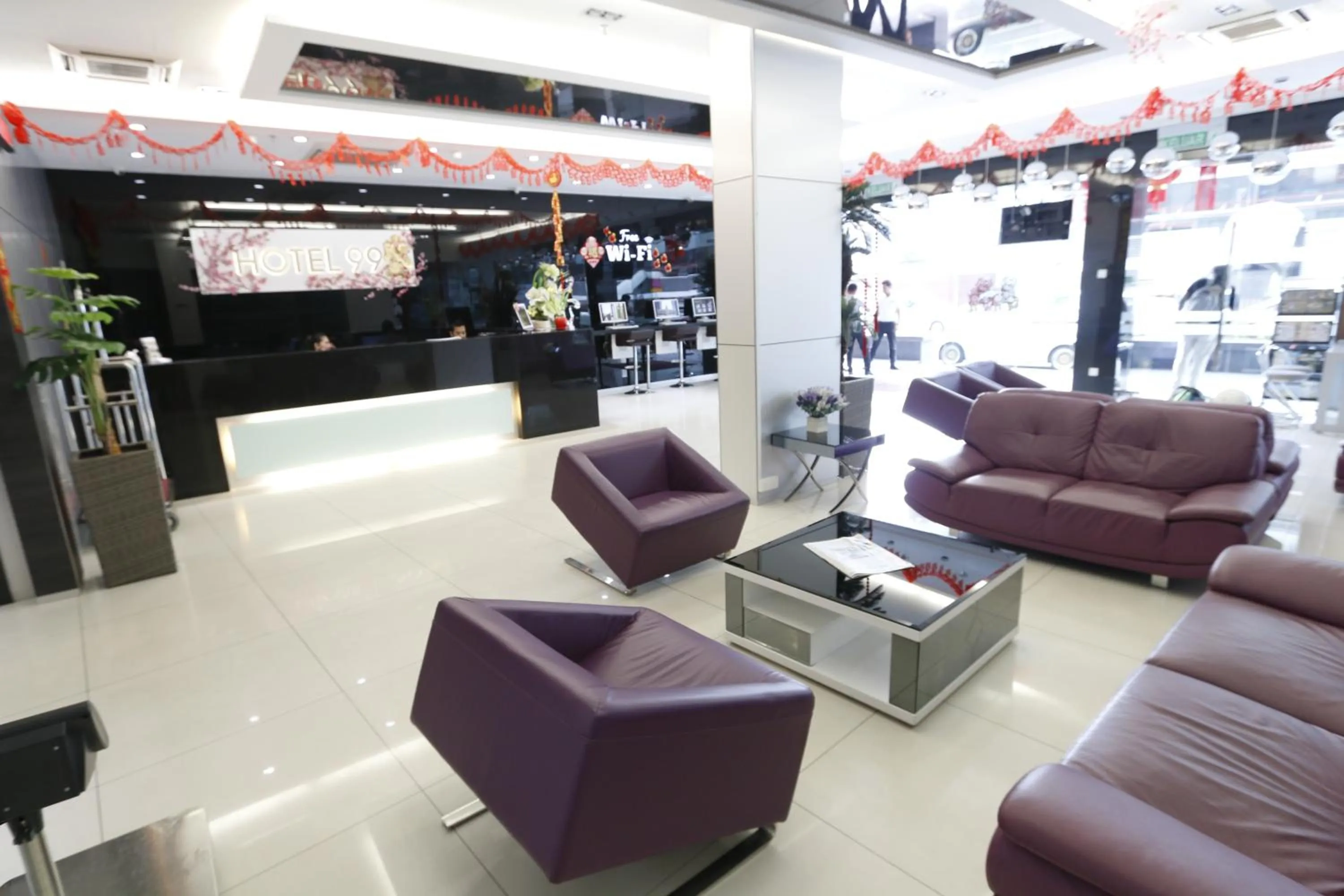 Communal lounge/ TV room in Hotel 99 Kuala Lumpur City