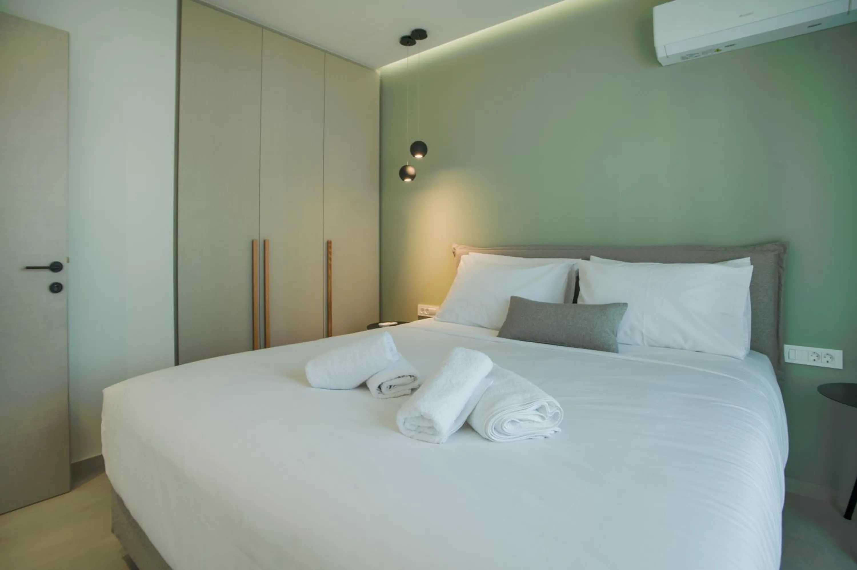 Bed in Celine Luxury Apartments & Suites
