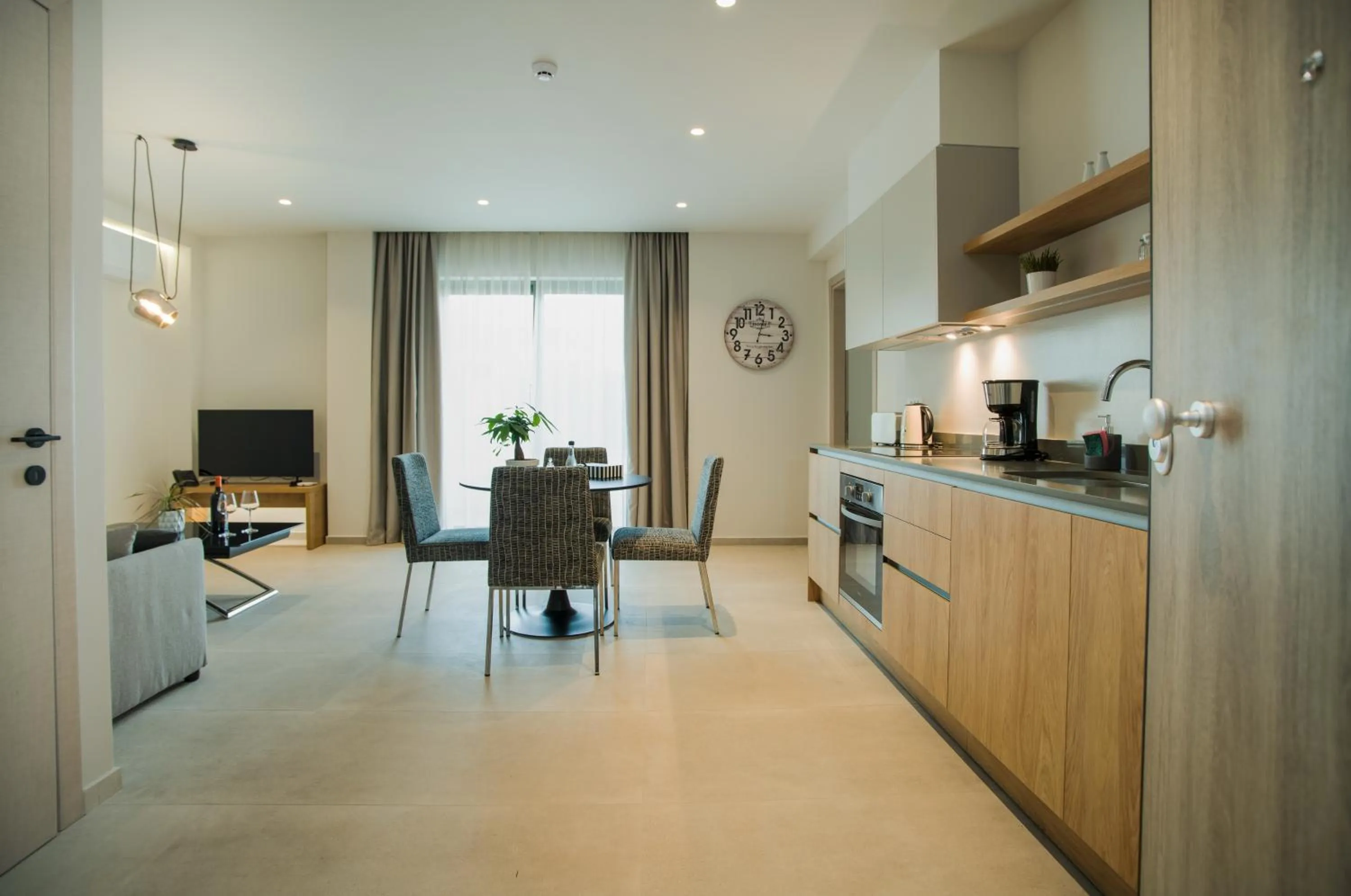 TV and multimedia in Celine Luxury Apartments & Suites