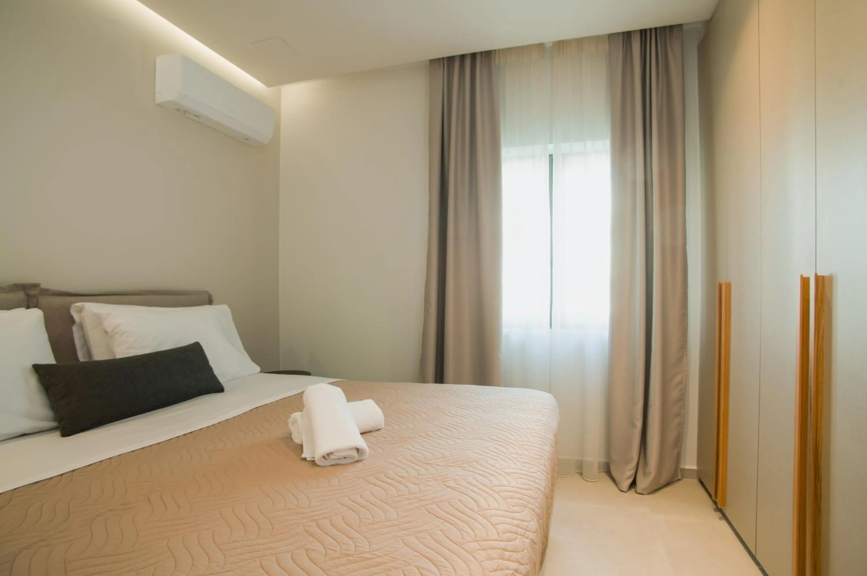 Bed in Celine Luxury Apartments & Suites