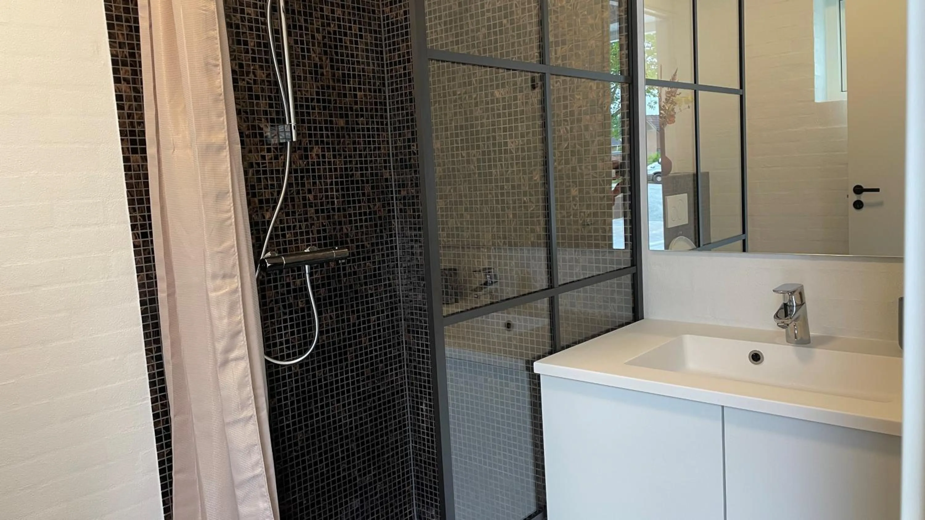 Bathroom in Holiday Rooms Møllebo