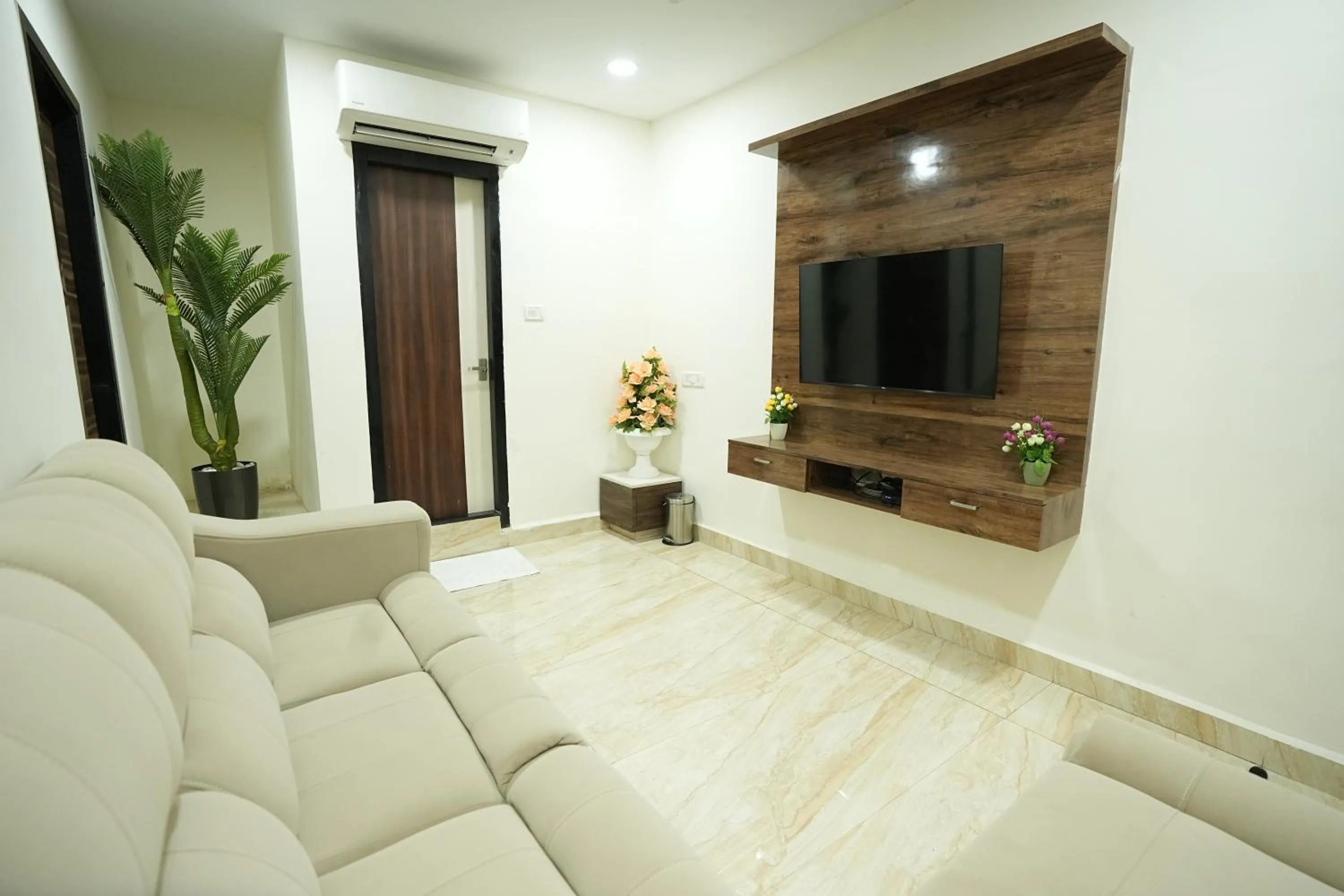 Living room in Grace Residency Chennai Airport