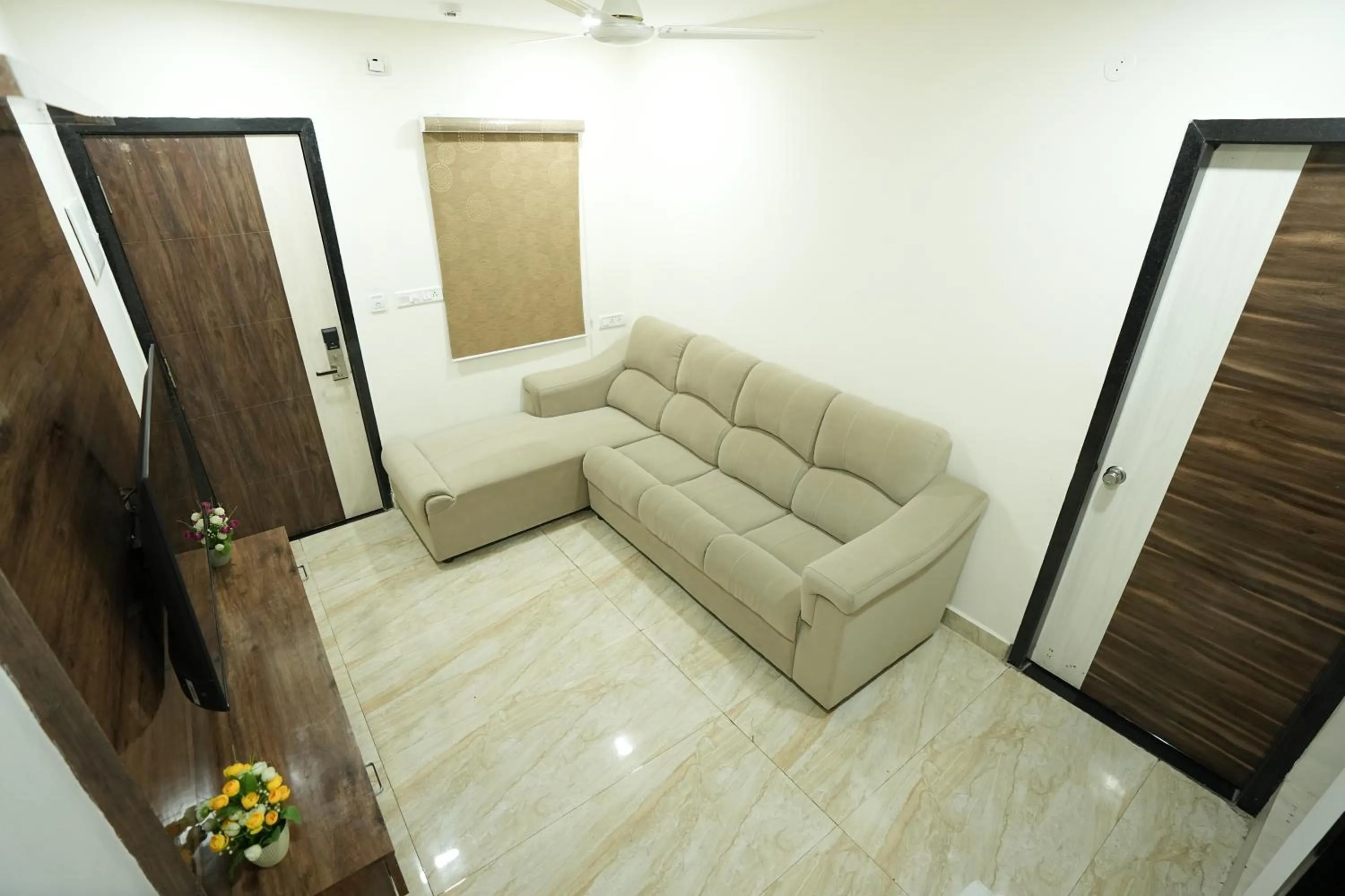 Living room in Grace Residency Chennai Airport