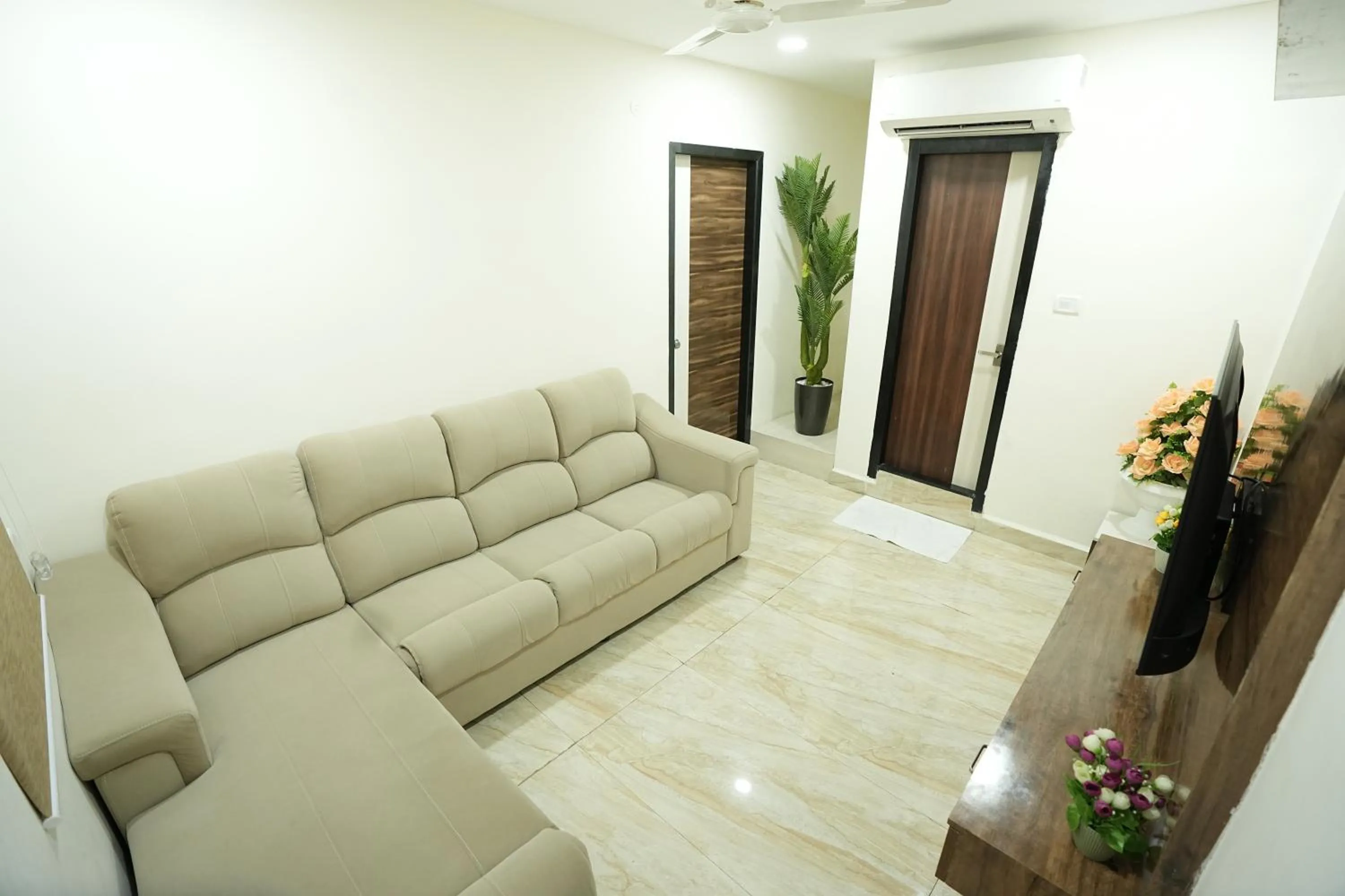 Living room in Grace Residency Chennai Airport