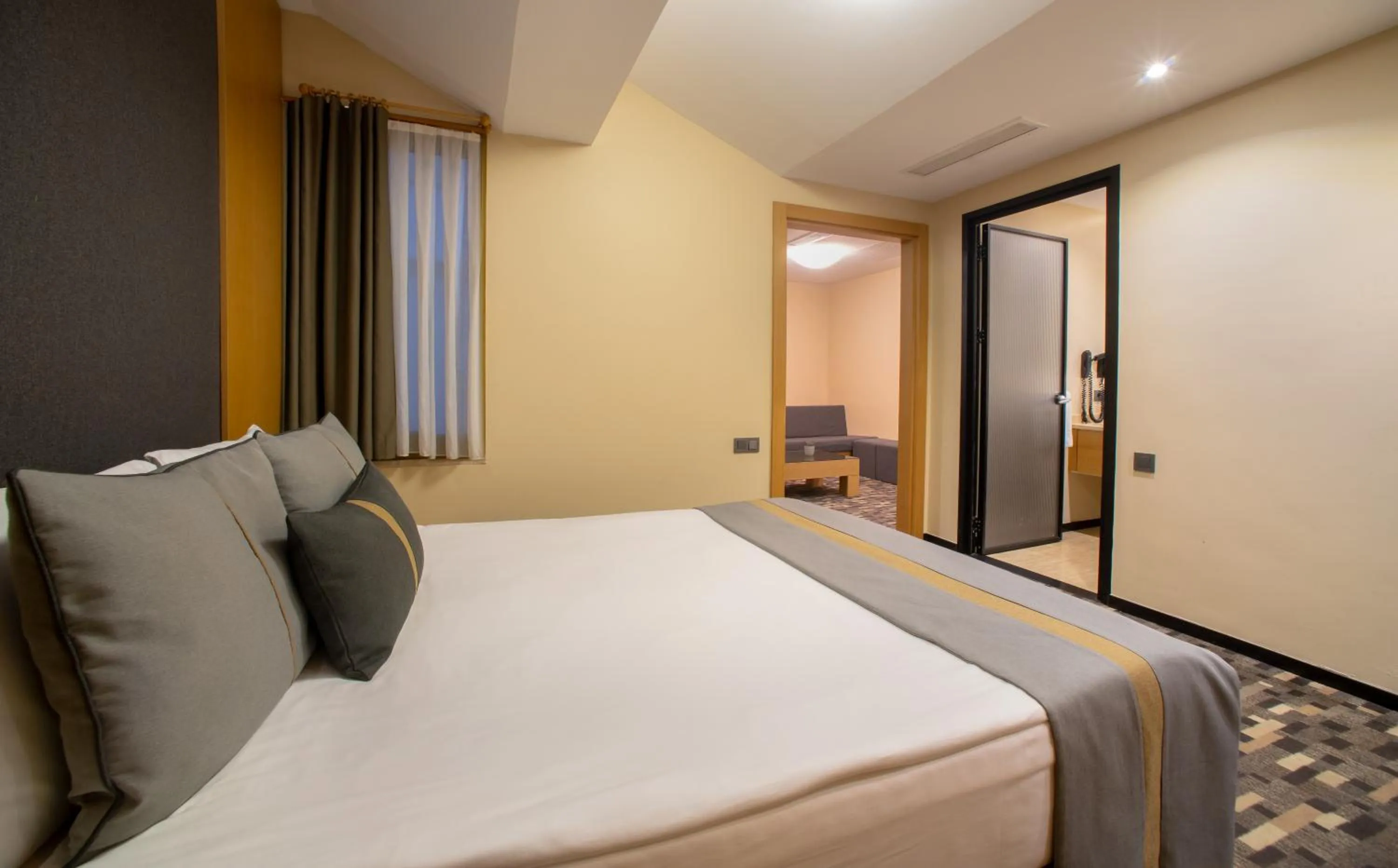 Bed in Tan Hotel - Special Category