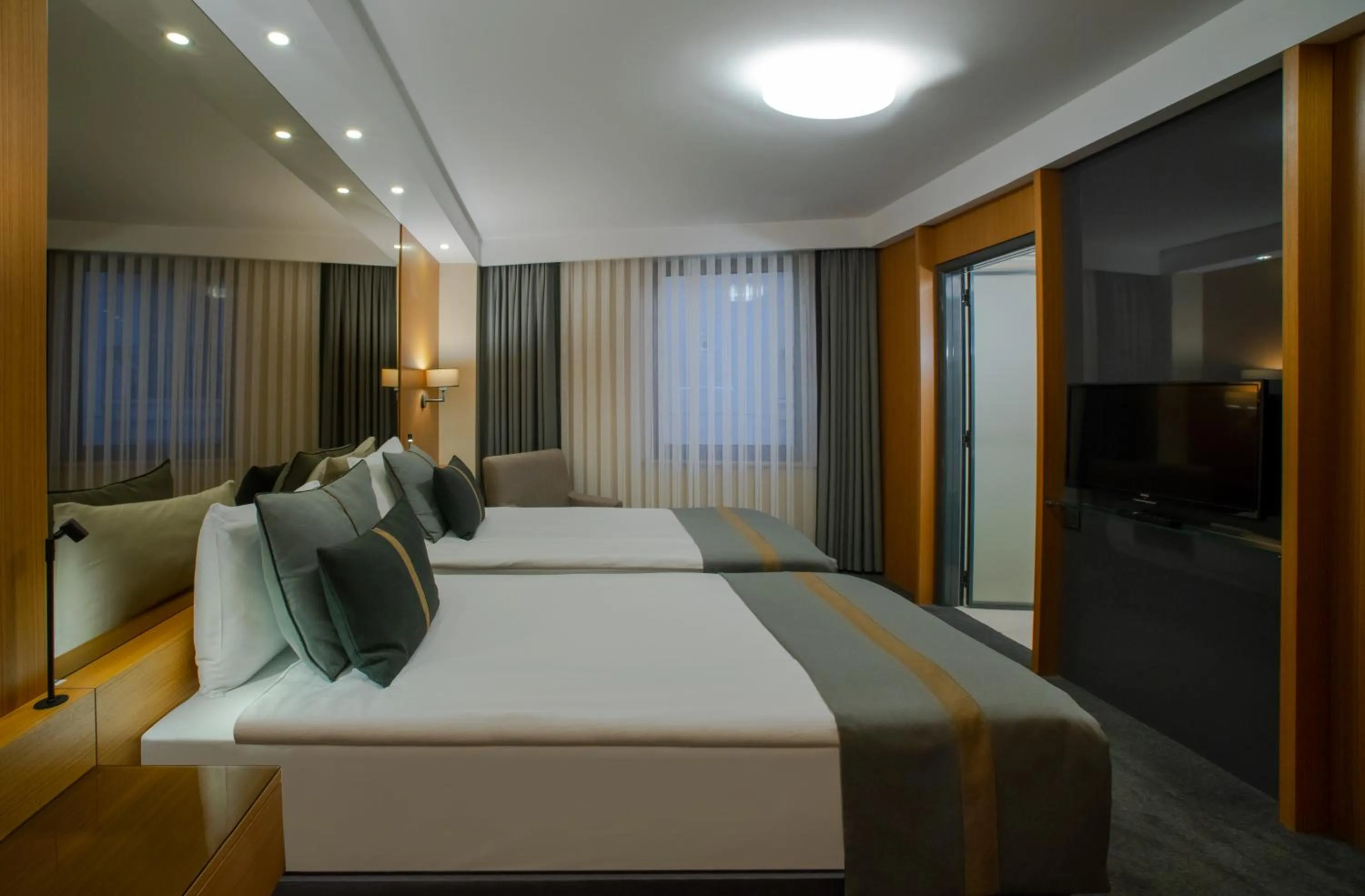 Bed in Tan Hotel - Special Category