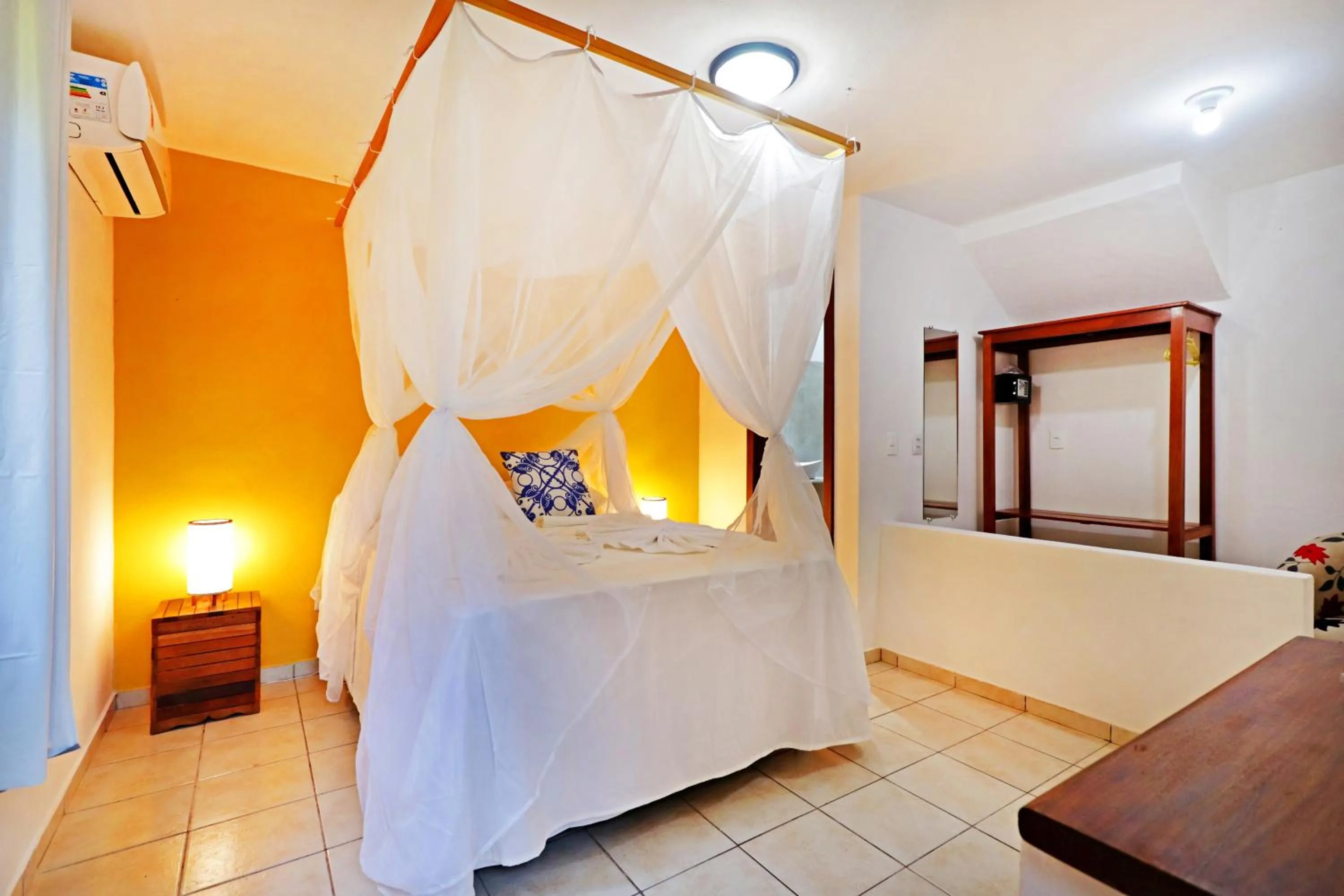 Bed in Pousada Arraial Colonial, Localizada no Centrinho e de Fácil Acesso a Praia e a Rua Mucugê