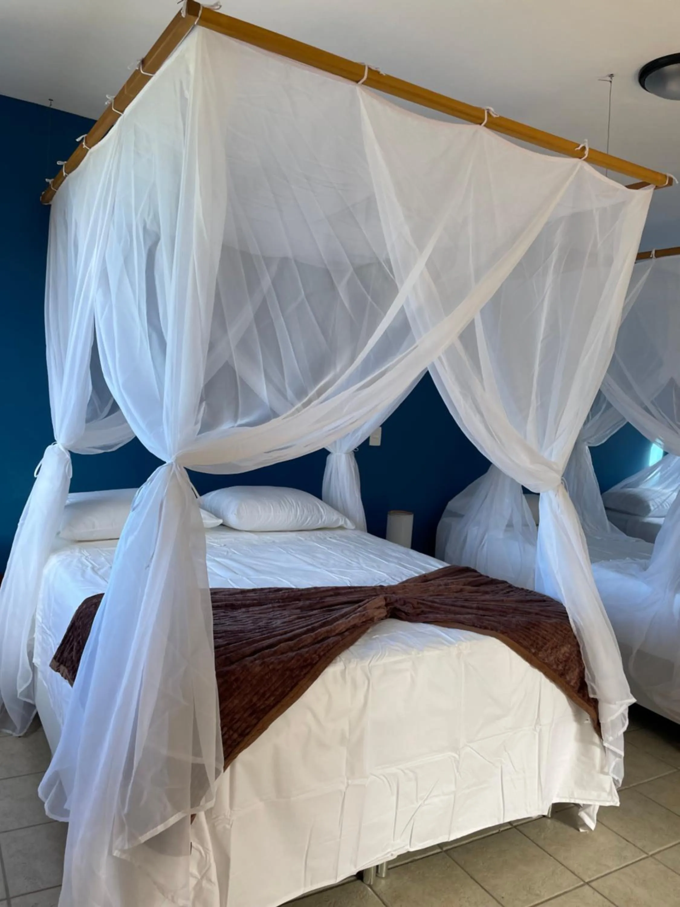 Bed in Pousada Arraial Colonial, Localizada no Centrinho e de Fácil Acesso a Praia e a Rua Mucugê