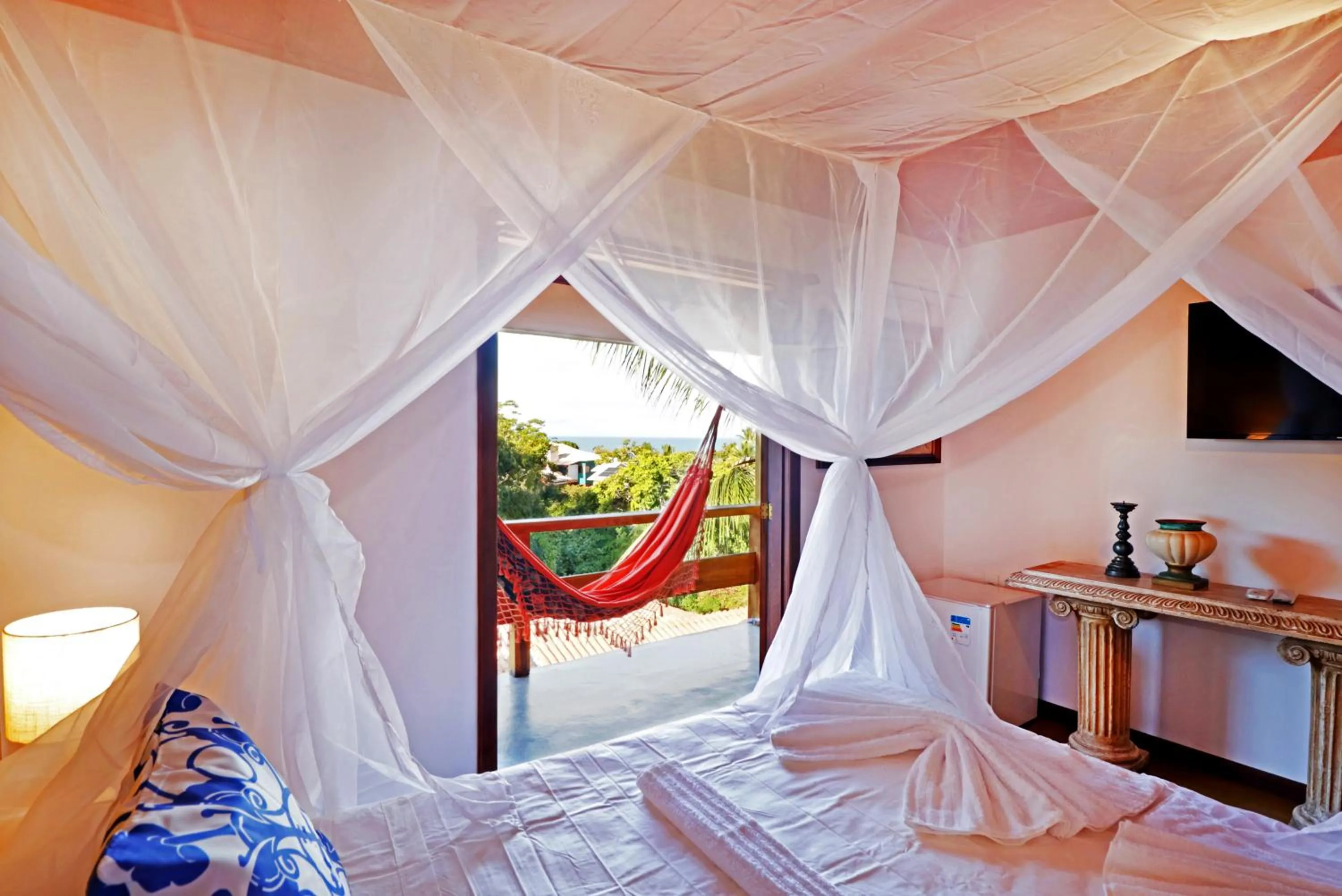 Bed in Pousada Arraial Colonial, Localizada no Centrinho e de Fácil Acesso a Praia e a Rua Mucugê