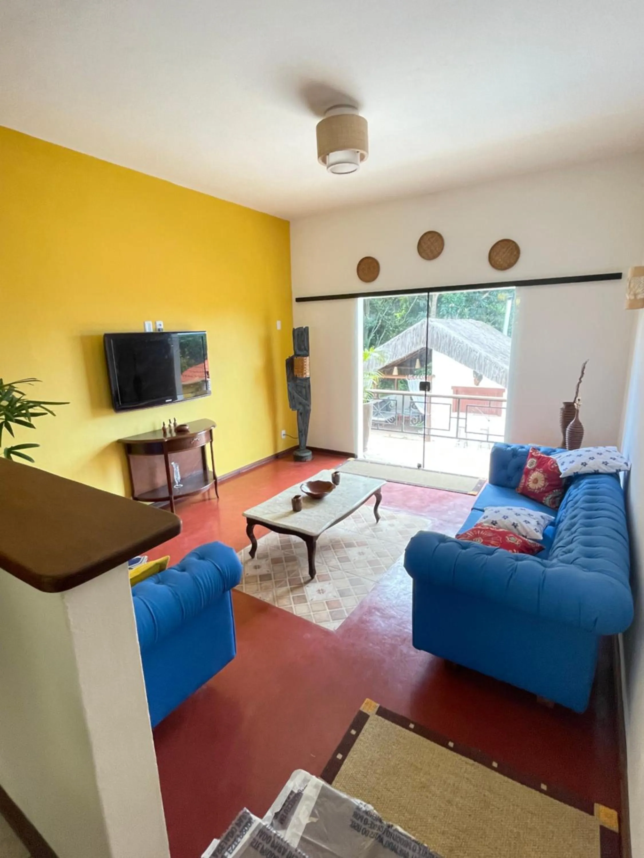 Living room in Pousada Arraial Colonial, Localizada no Centrinho e de Fácil Acesso a Praia e a Rua Mucugê