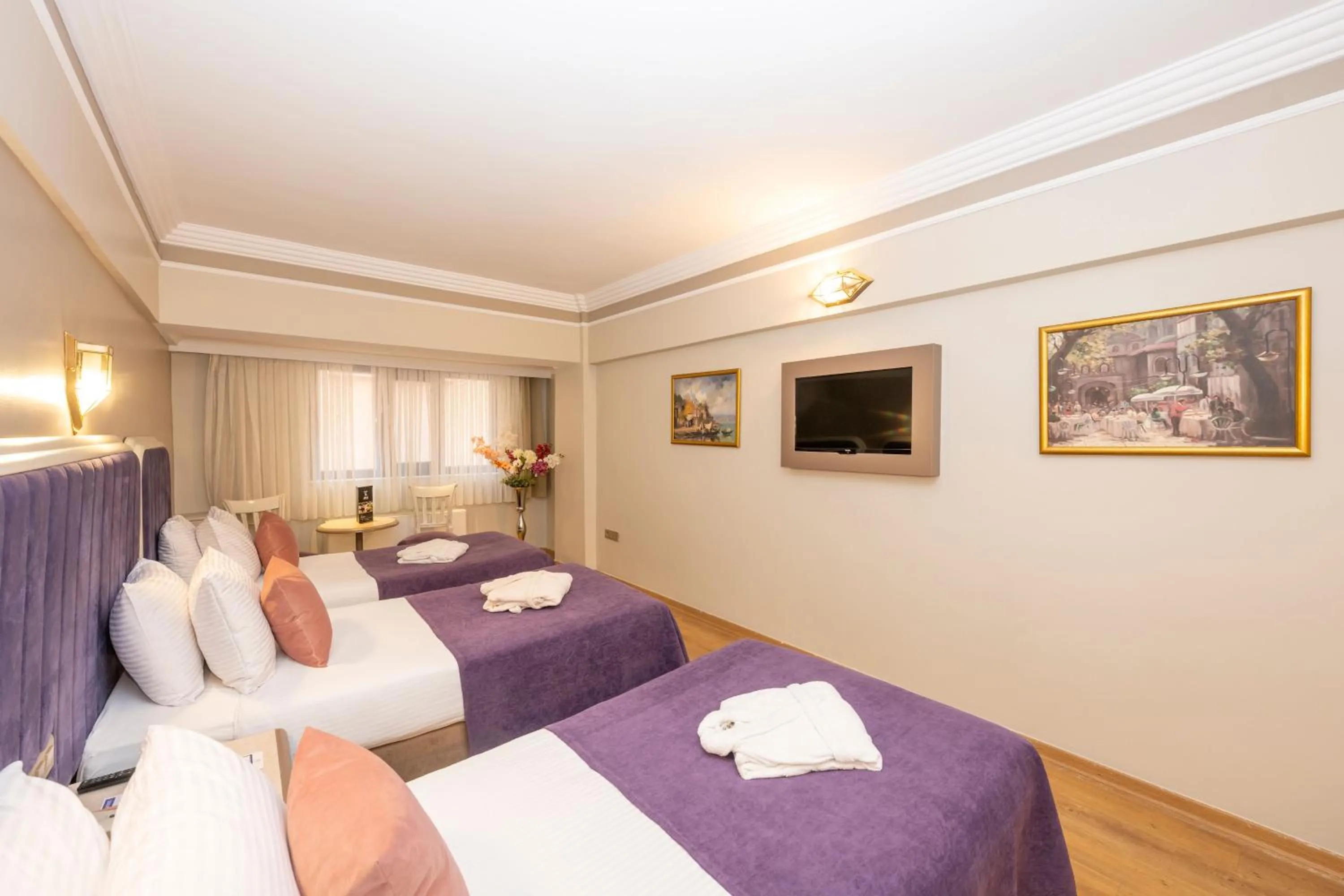 Bed in Grand Anka Hotel