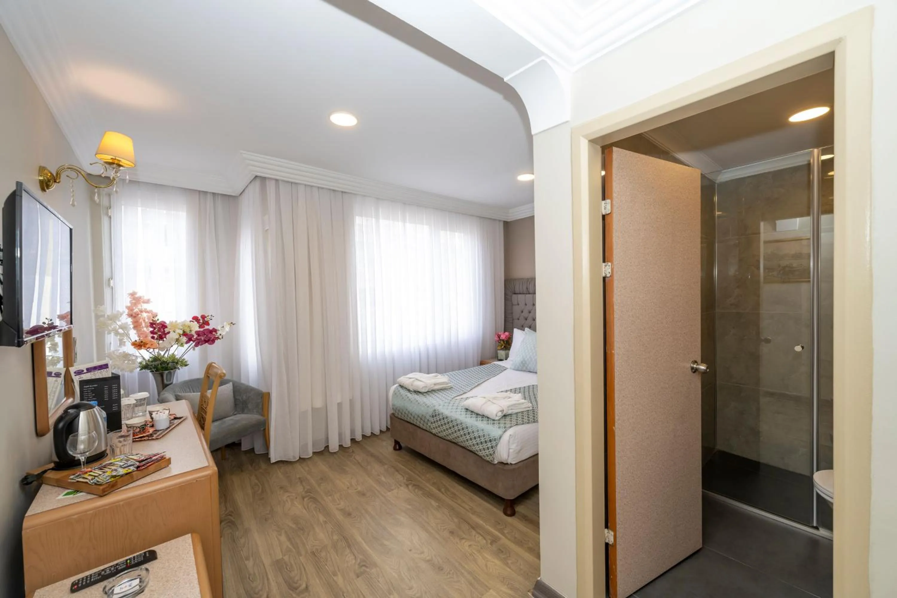 Bed in Grand Anka Hotel