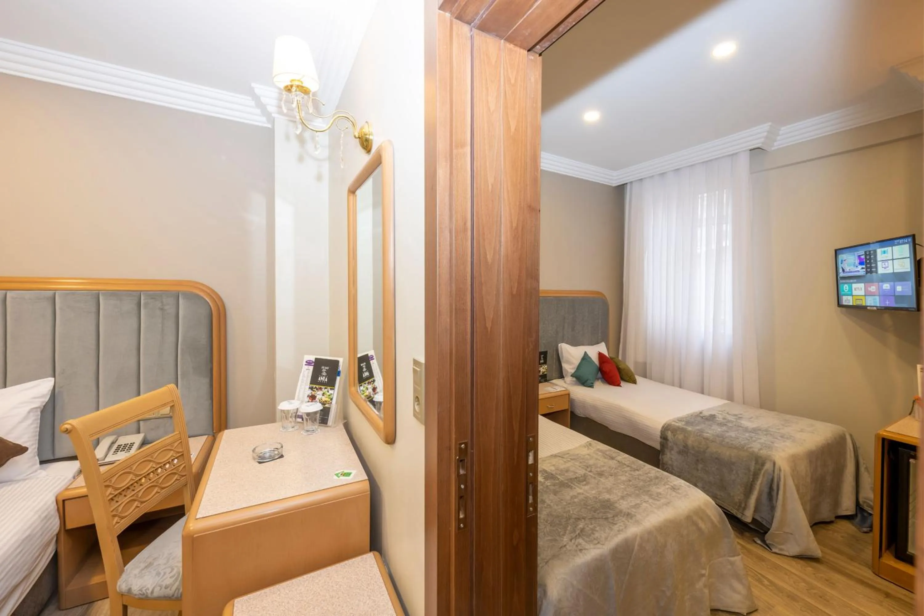 Bed in Grand Anka Hotel