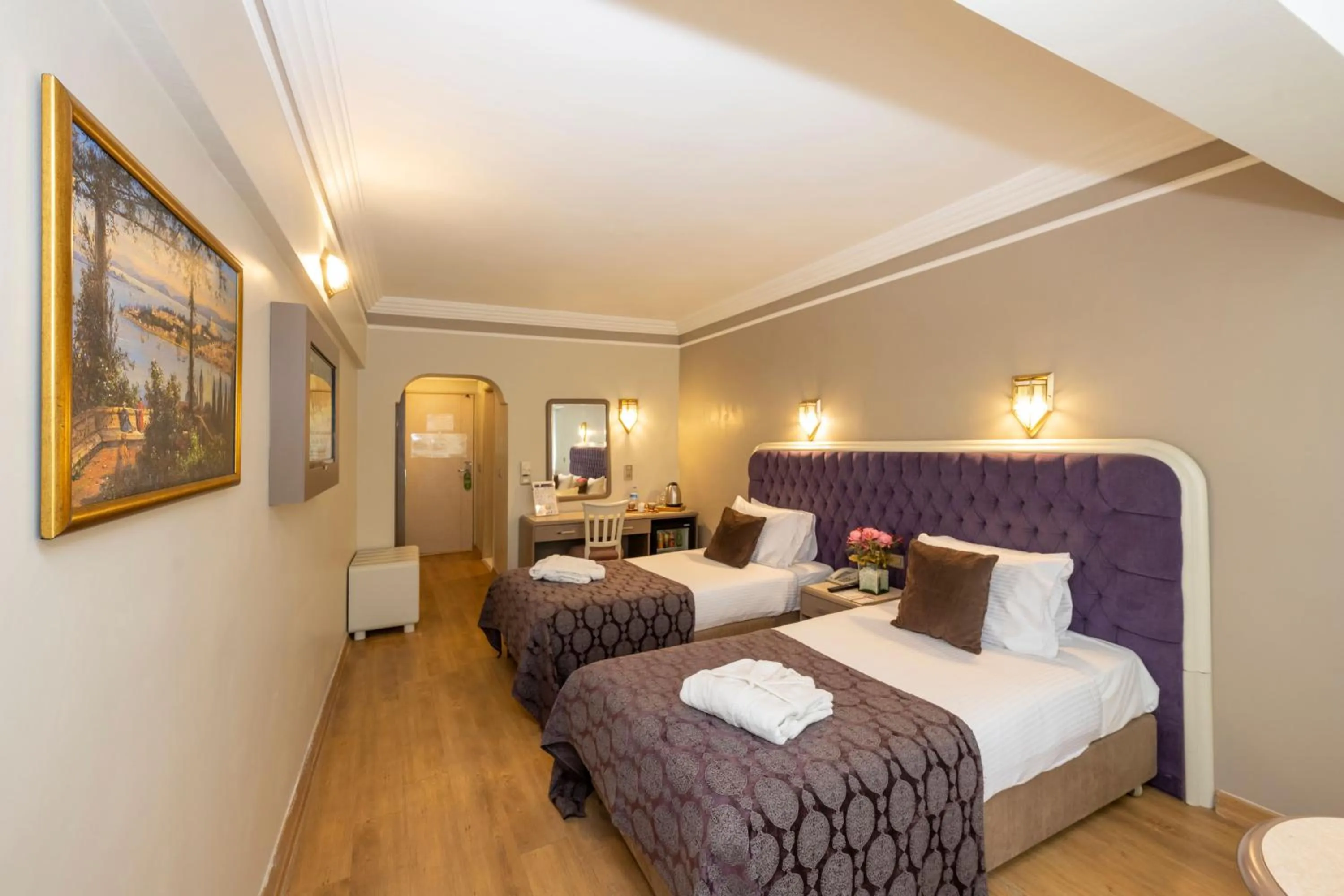 Bed in Grand Anka Hotel