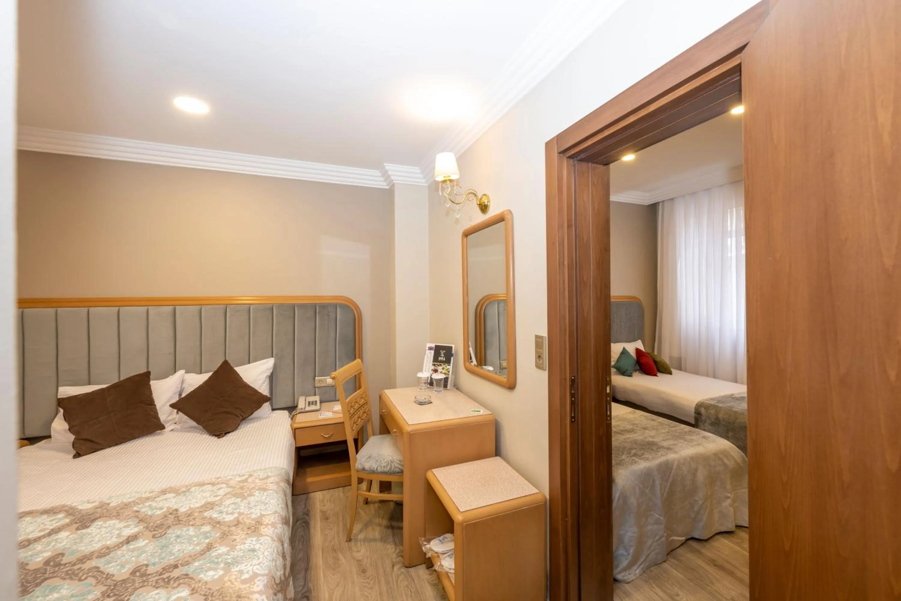 Bed in Grand Anka Hotel