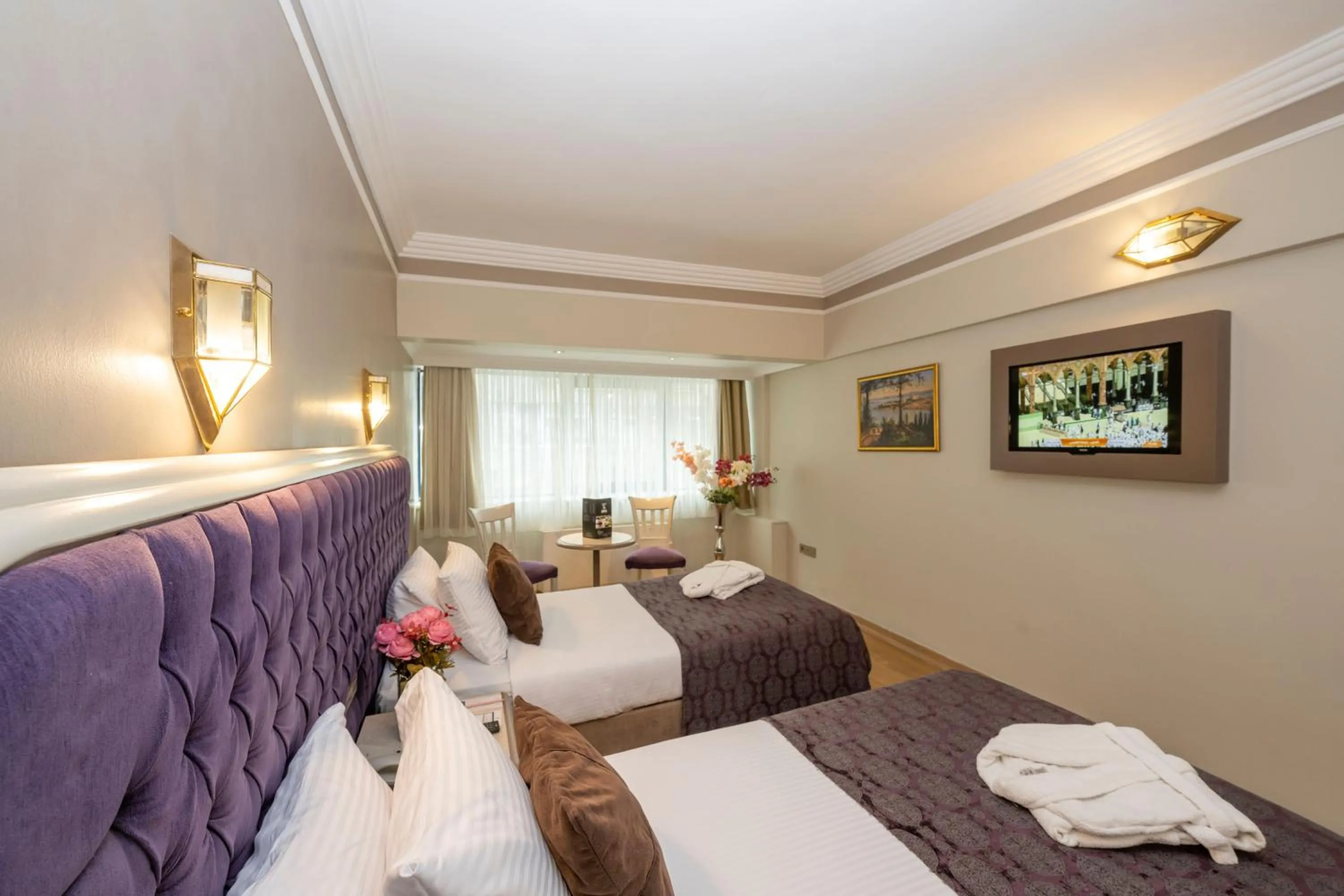 Bed in Grand Anka Hotel