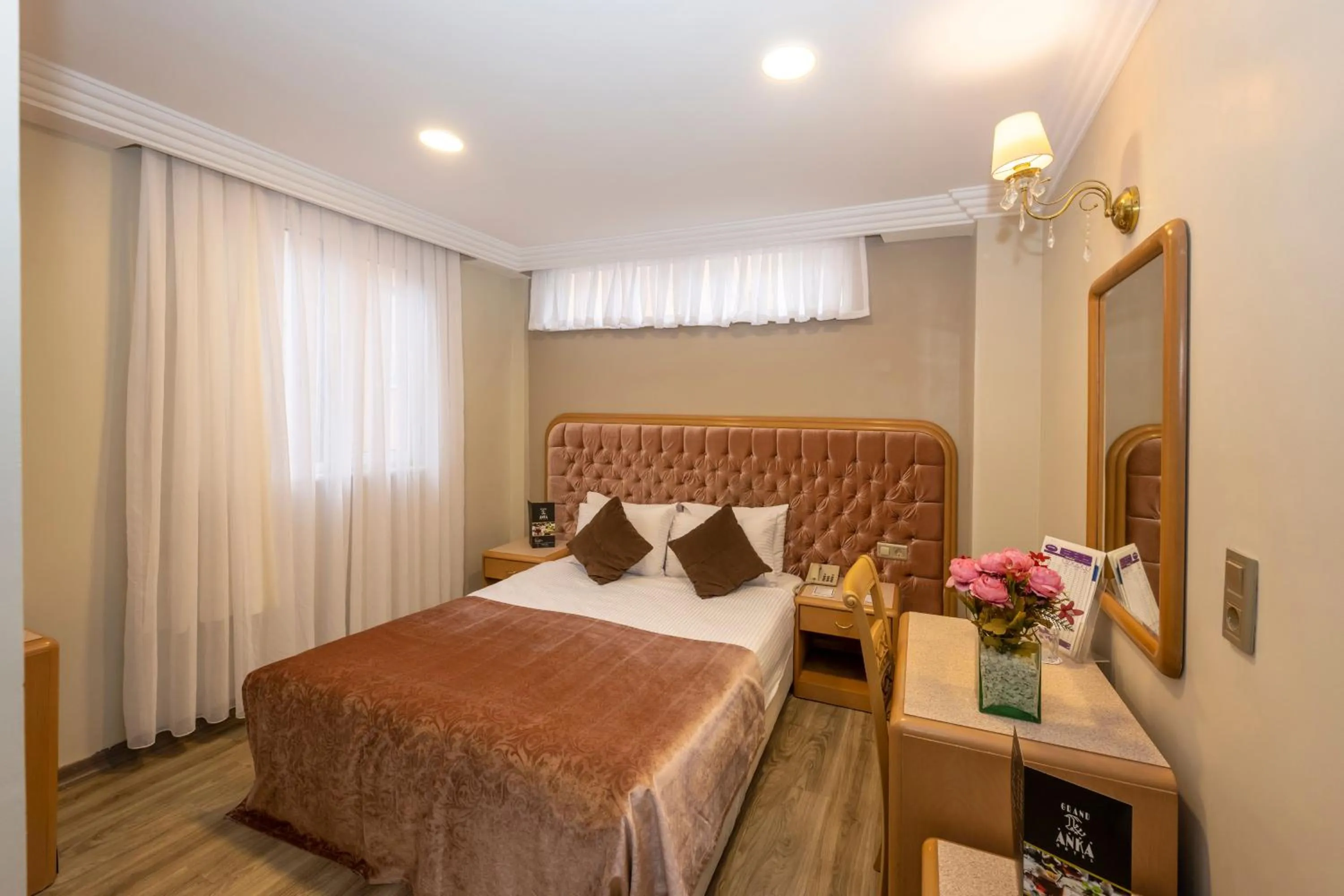 Photo of the whole room, Bed in Grand Anka Hotel