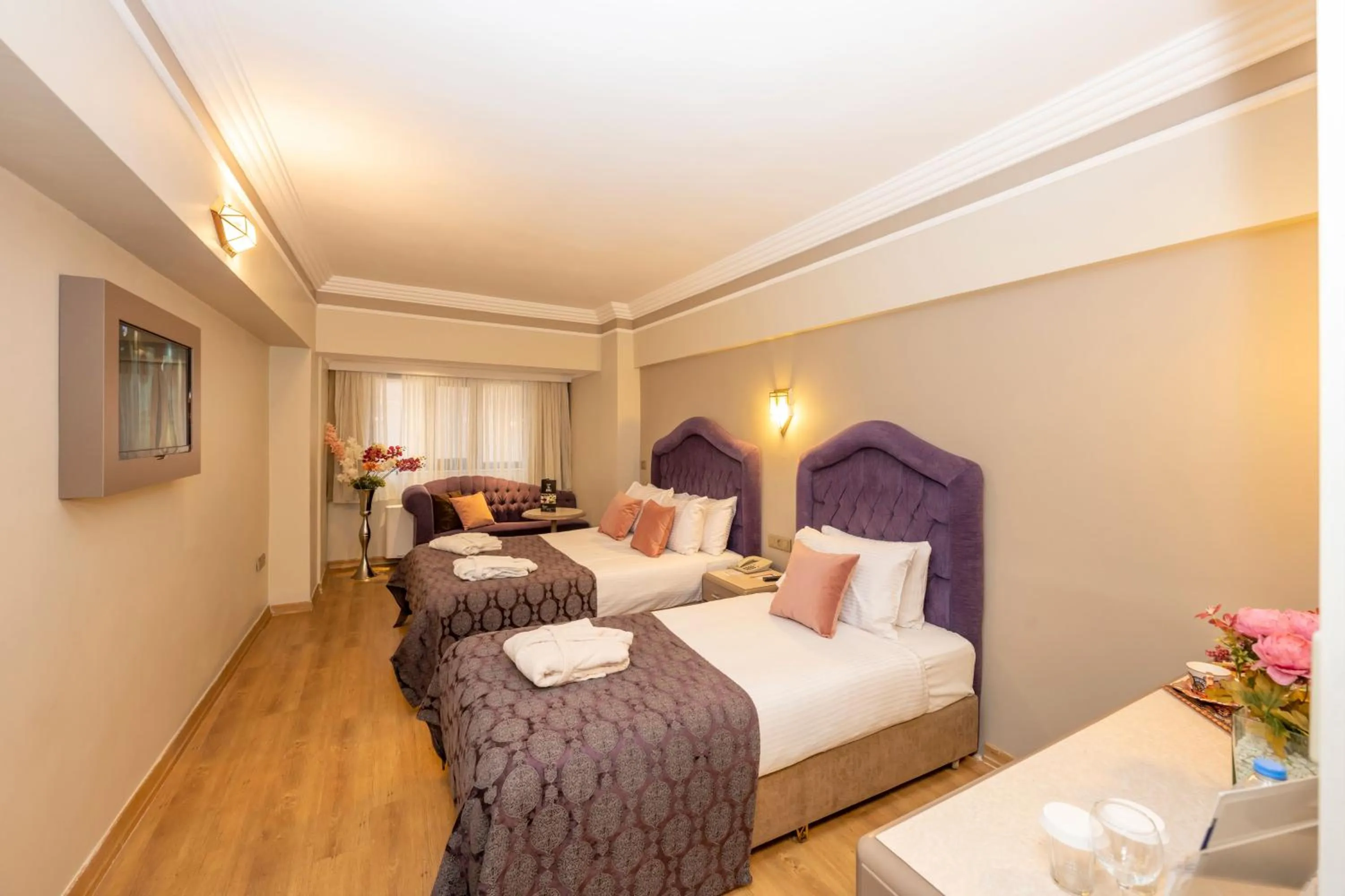 Bed in Grand Anka Hotel