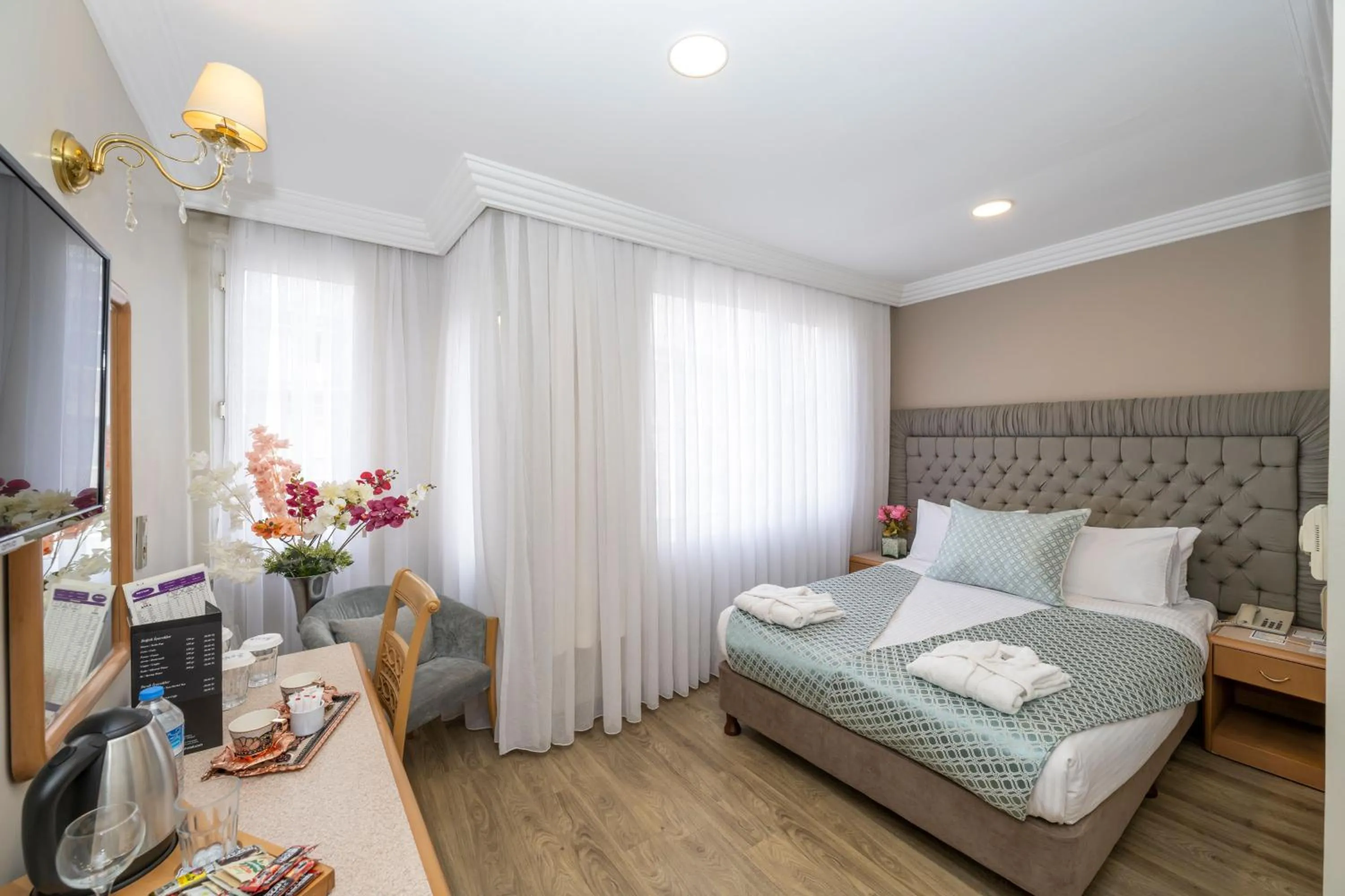 Shower, Bed in Grand Anka Hotel