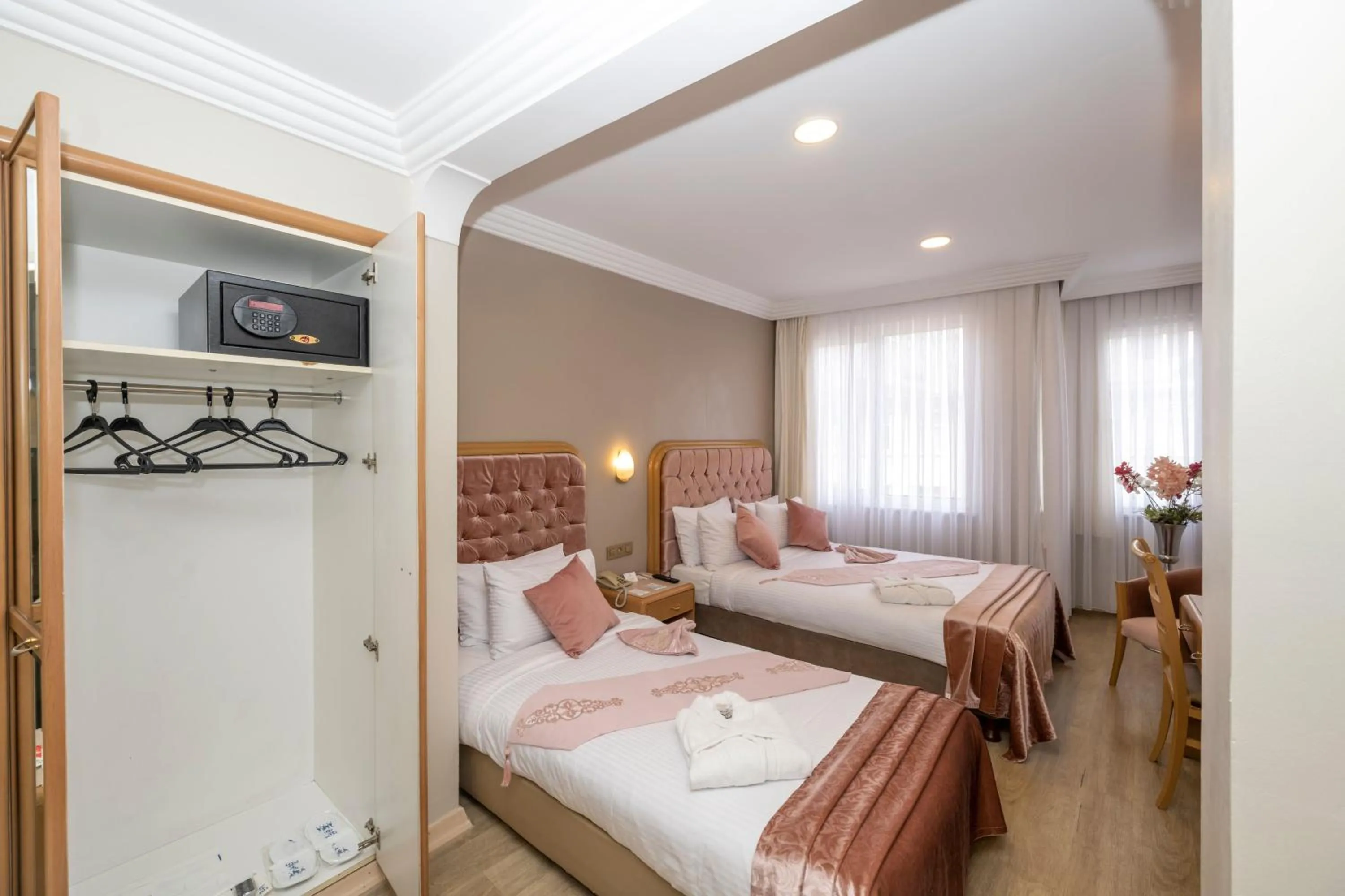 Bed in Grand Anka Hotel