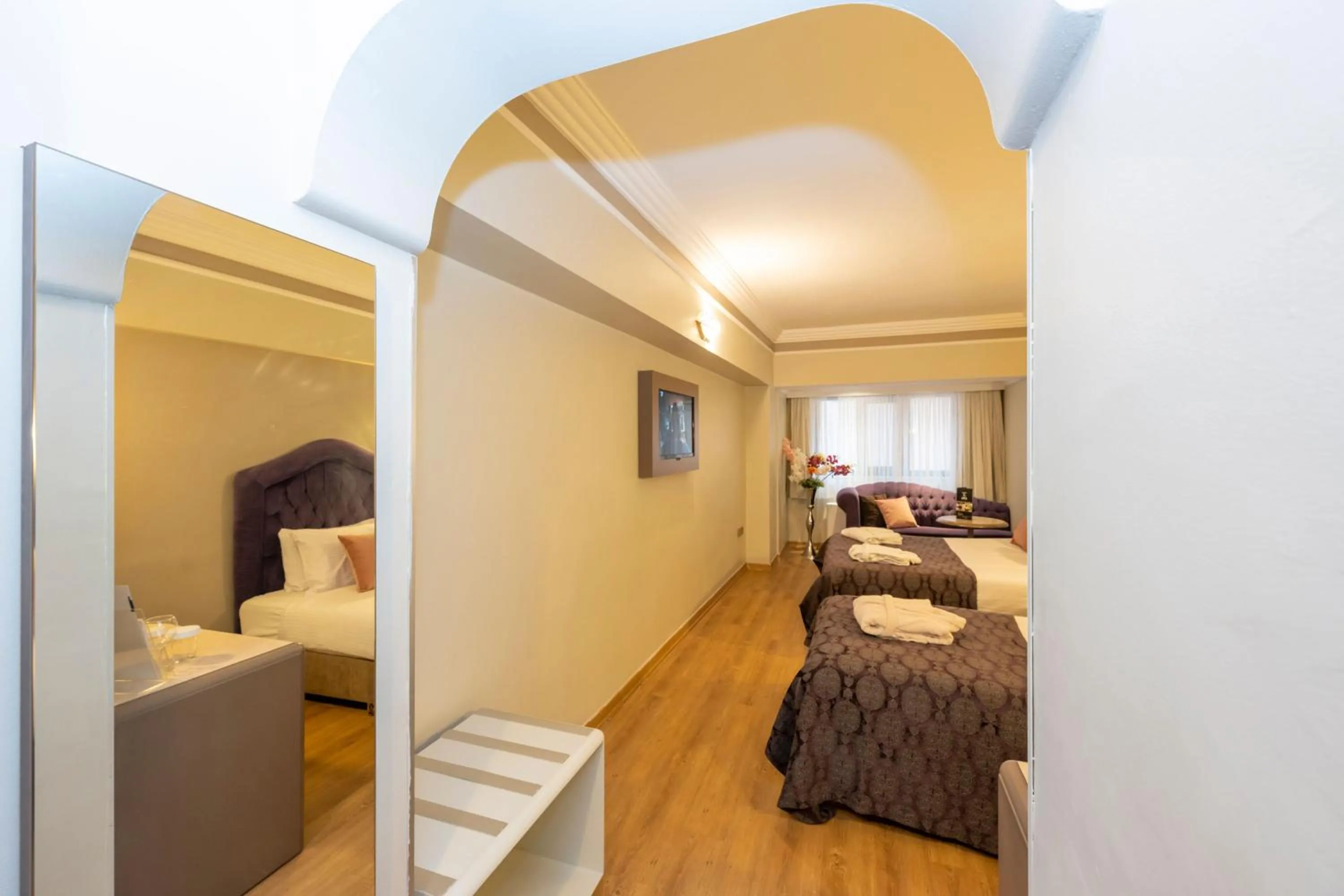 Bed in Grand Anka Hotel