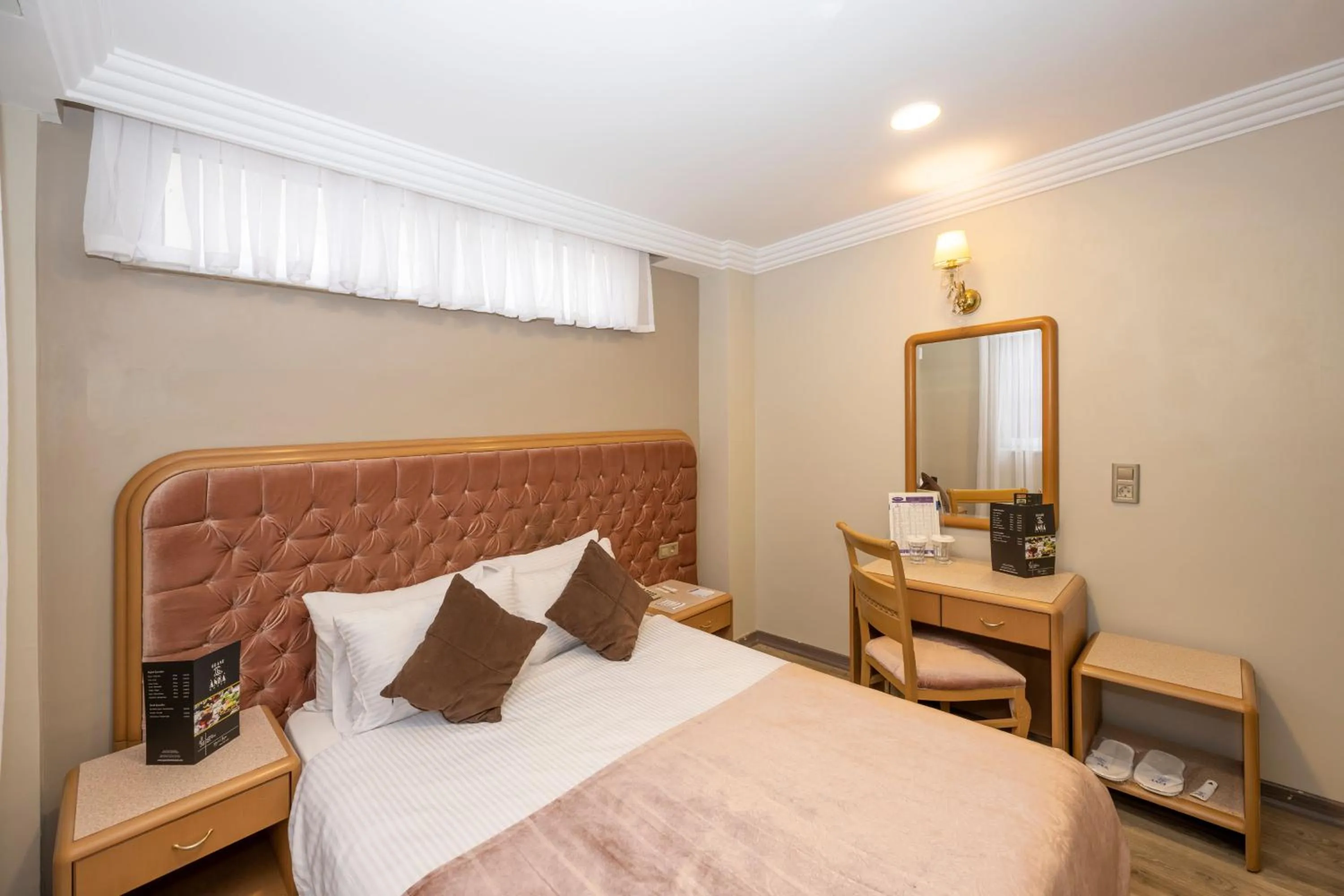 Bed in Grand Anka Hotel