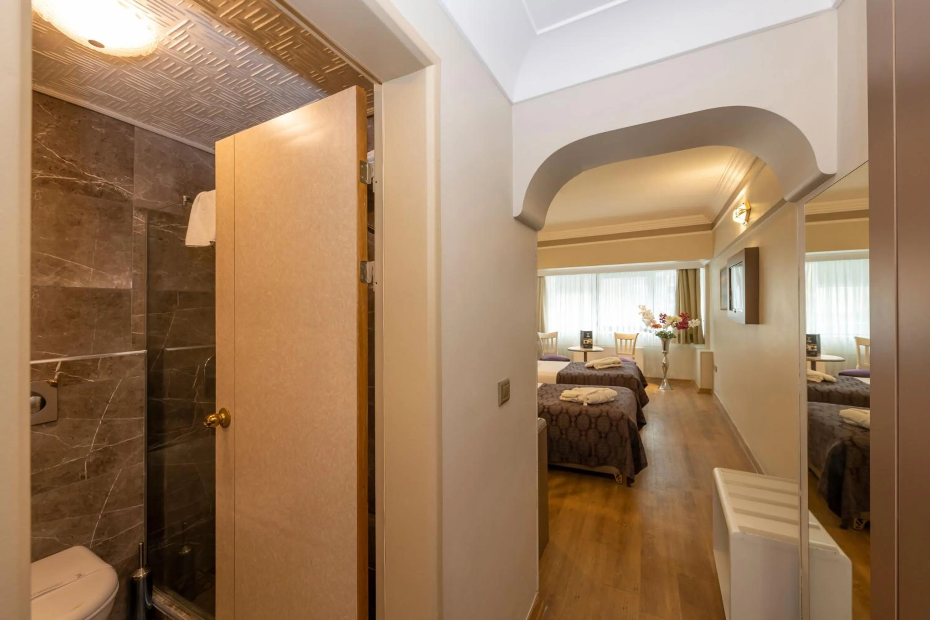 Bed in Grand Anka Hotel