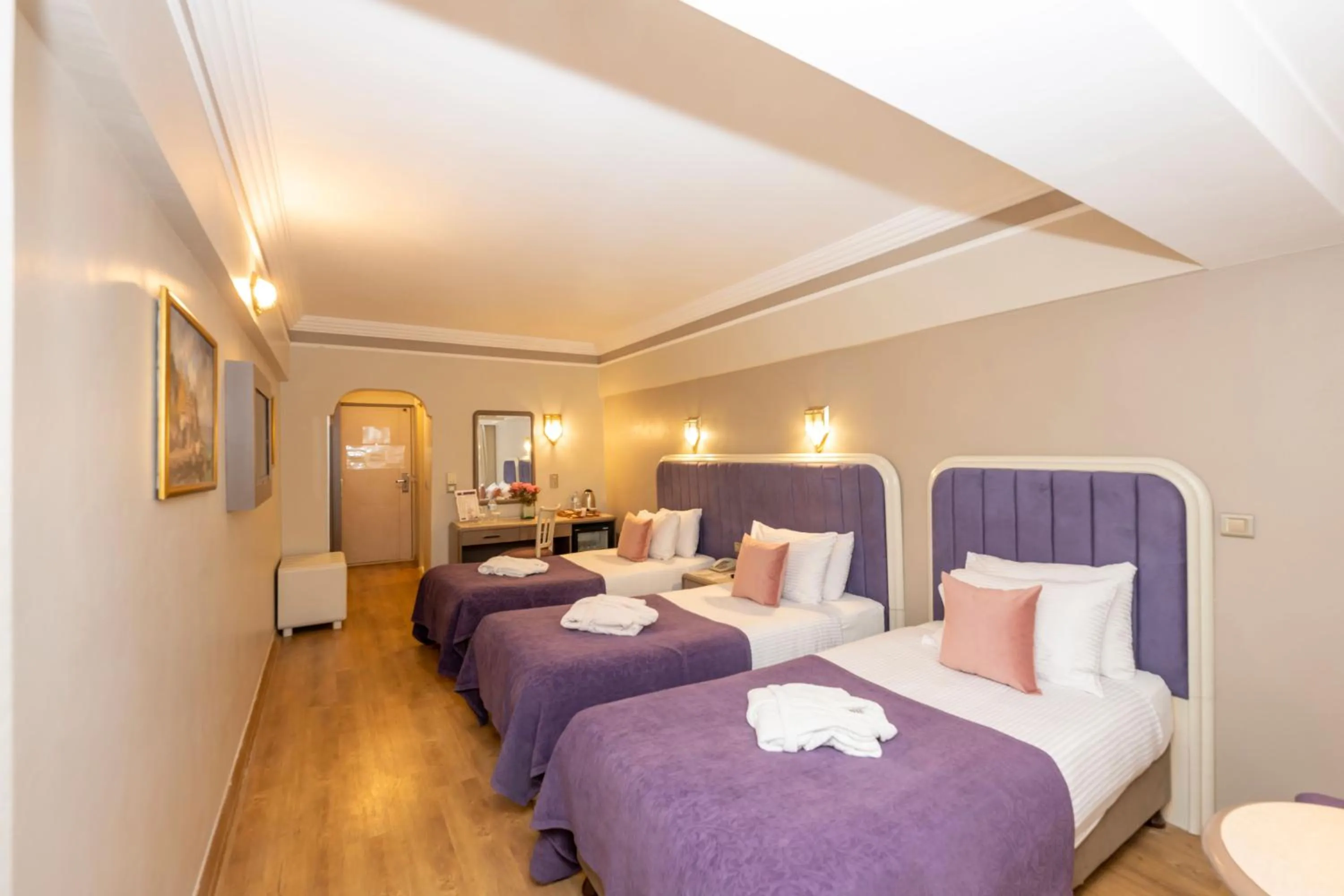 Bed in Grand Anka Hotel