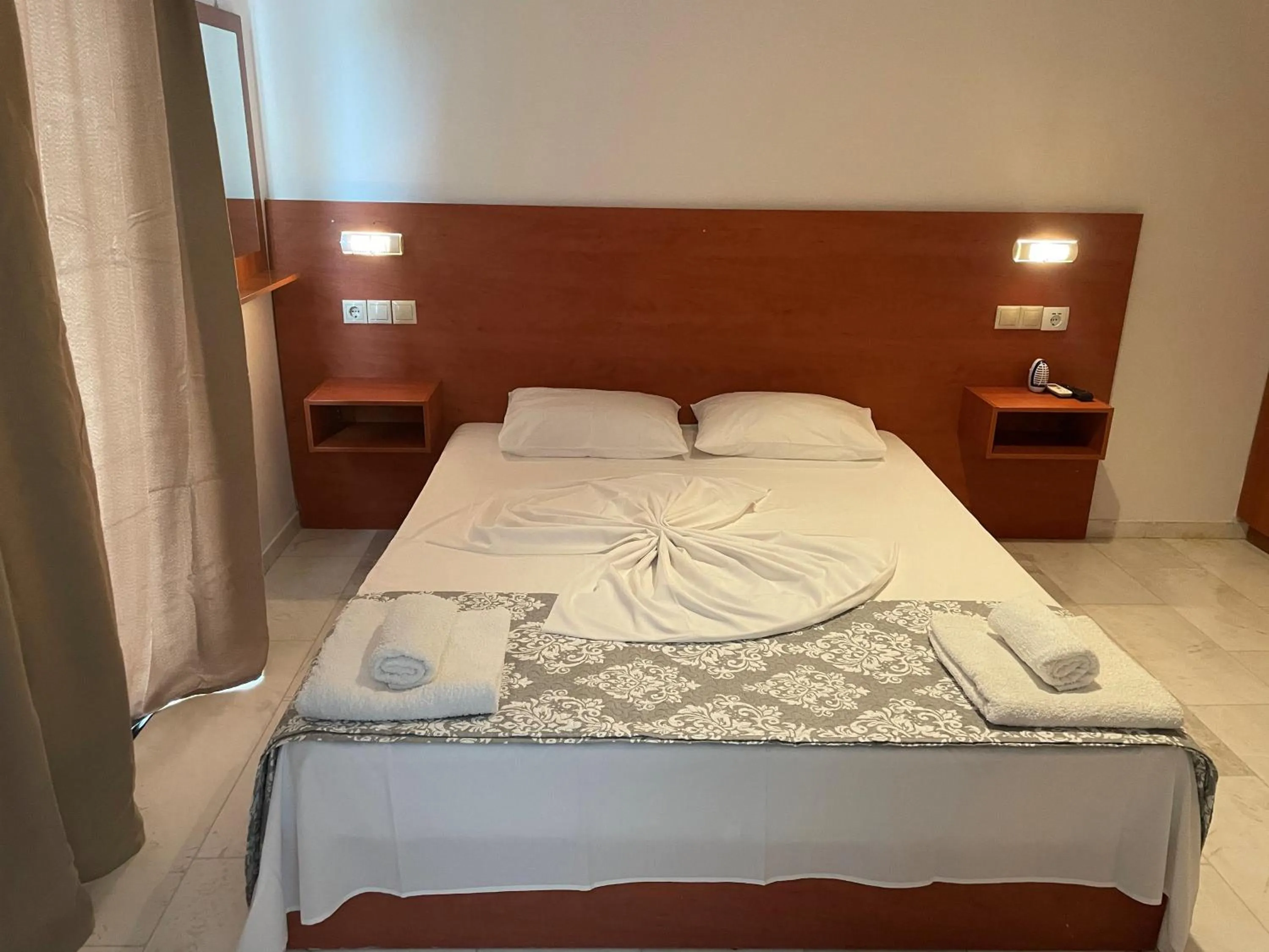 Bedroom in Hotel Kourkoumelata