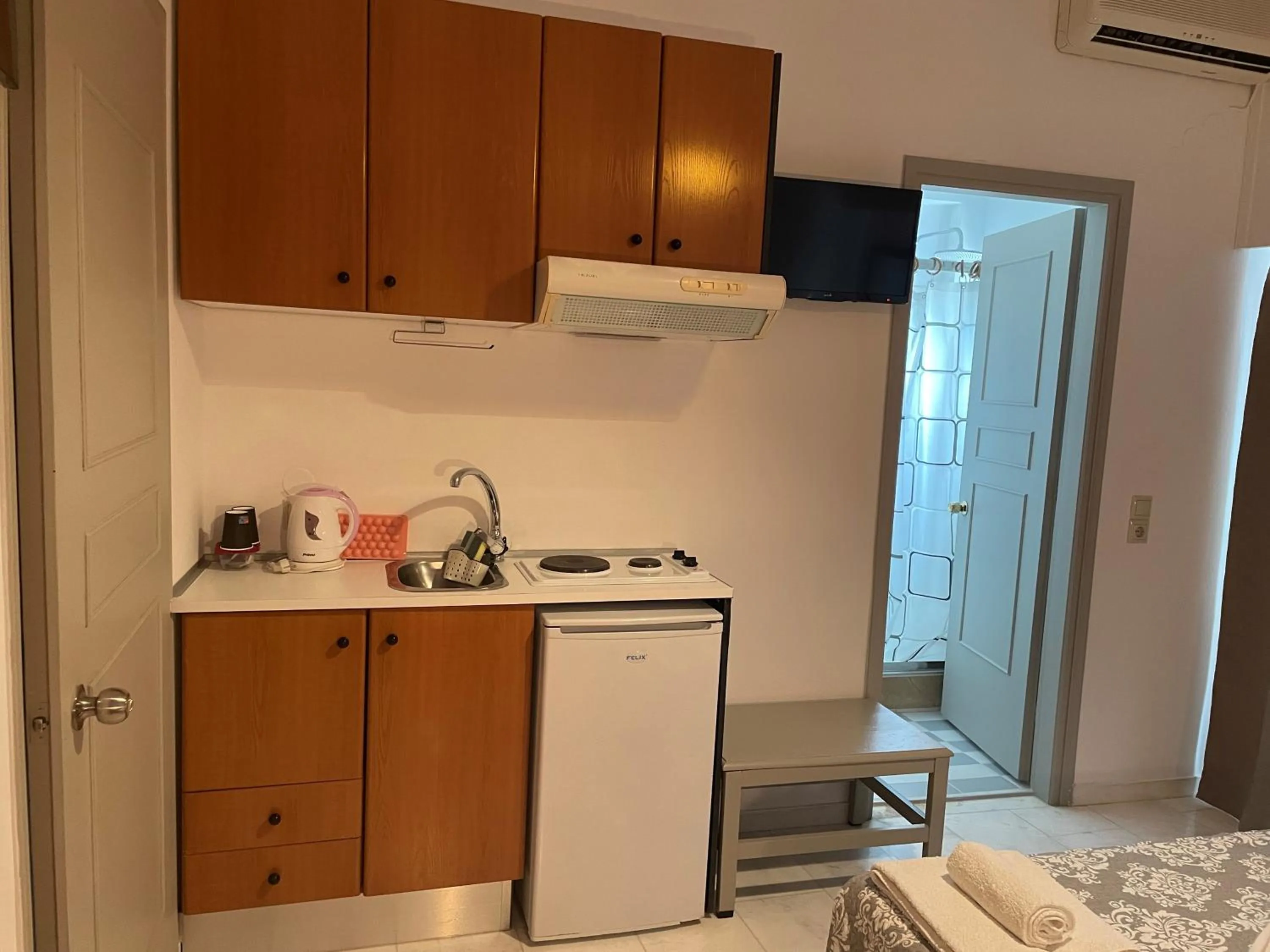 Kitchen or kitchenette in Hotel Kourkoumelata