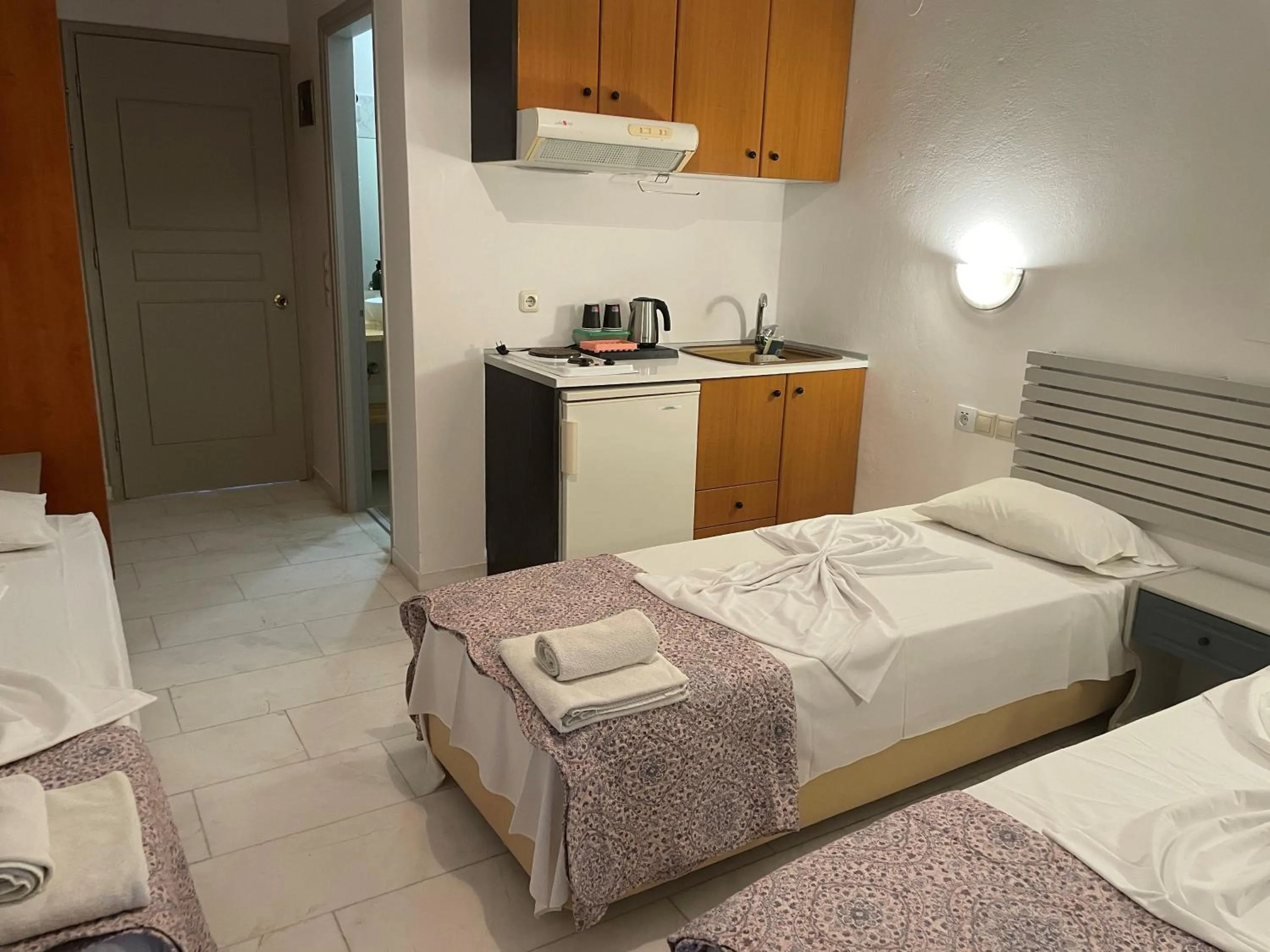 Bedroom in Hotel Kourkoumelata