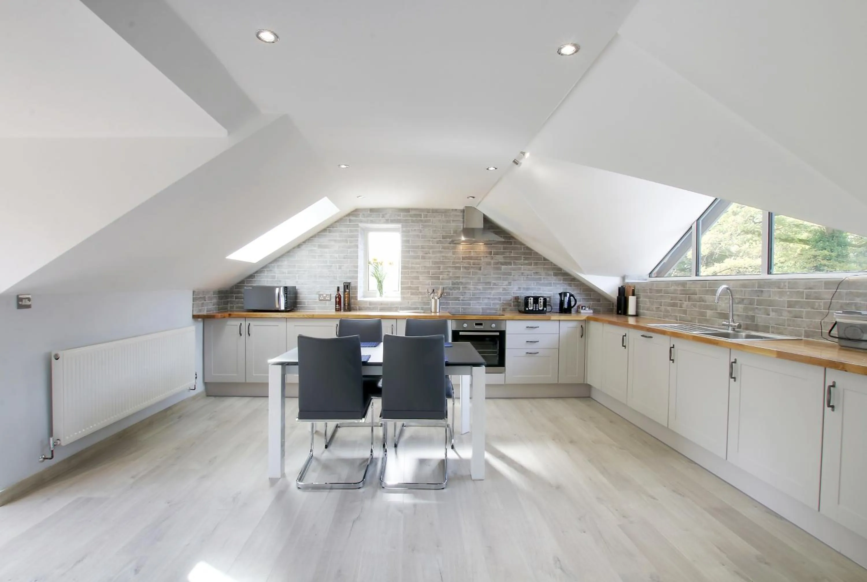 Kitchen or kitchenette in Swansea Valley Holiday Cottages