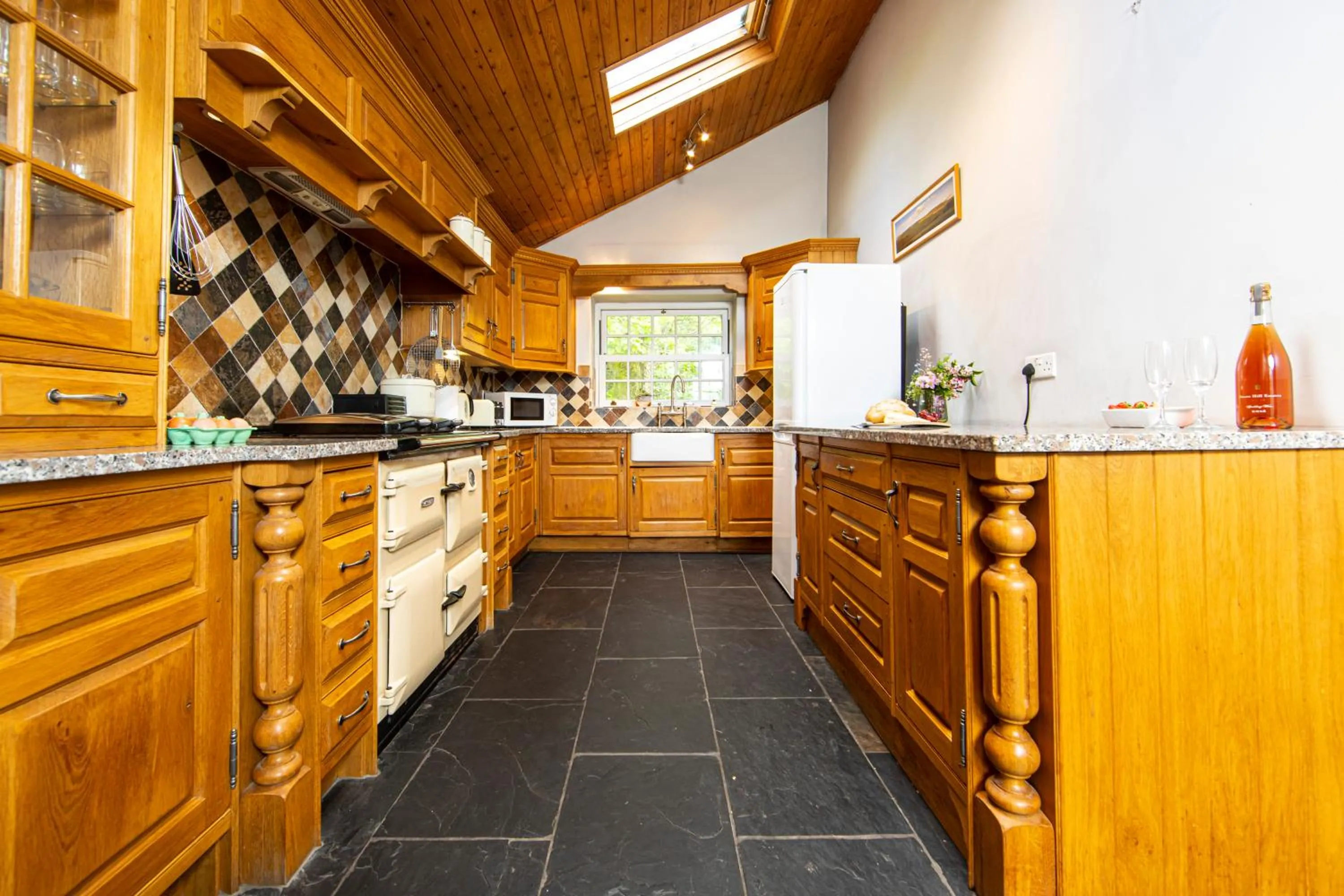 Kitchen or kitchenette in Swansea Valley Holiday Cottages