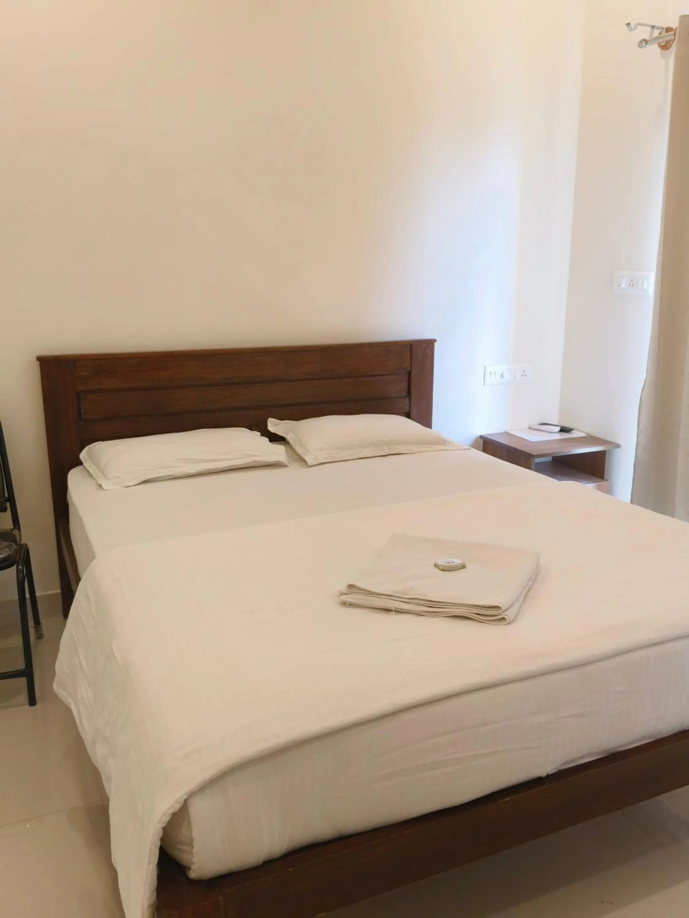 Bed in MITRA Hotels & Retreat