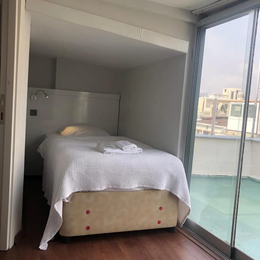 Bed in Hotel Antique