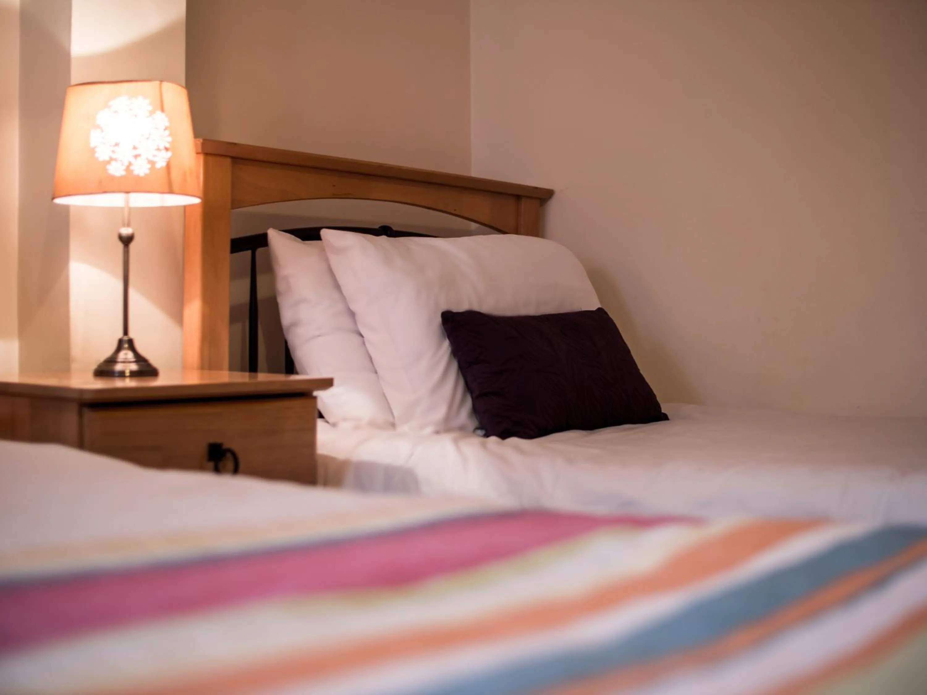 Bed in Donegan Court Aparthotel