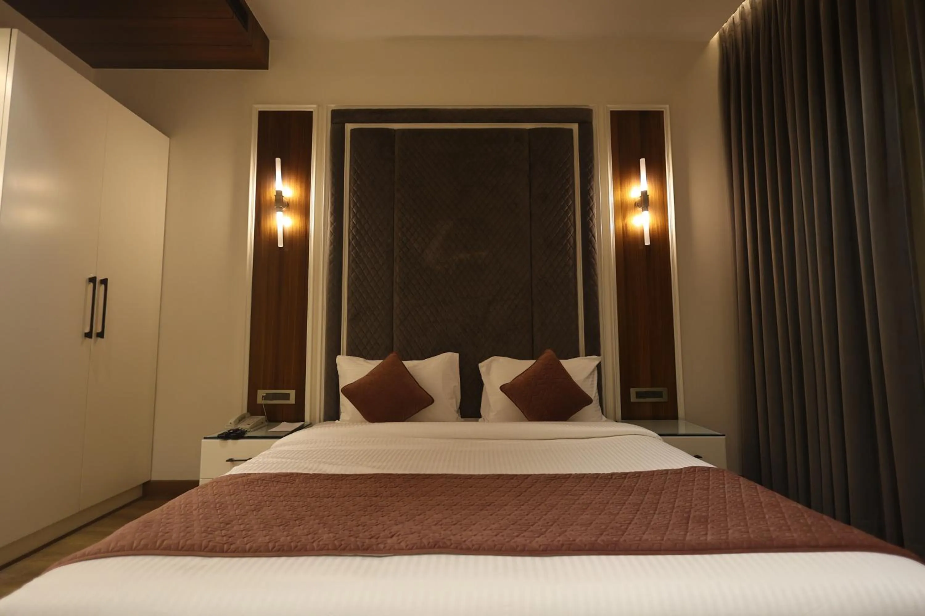 Bed in The Ramayana Hotel, Ayodhya