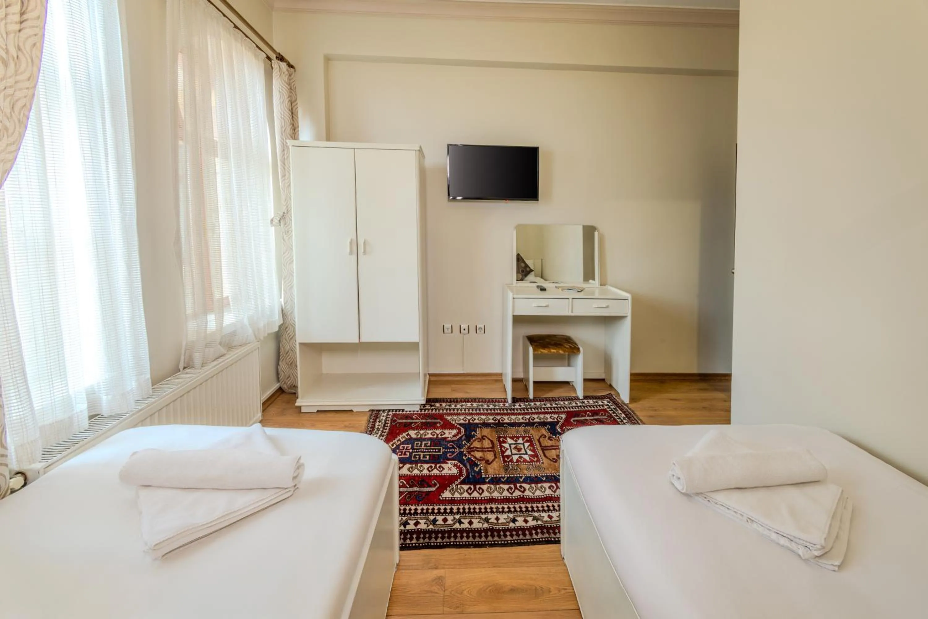 Bed in Akuzun Stone Hotel