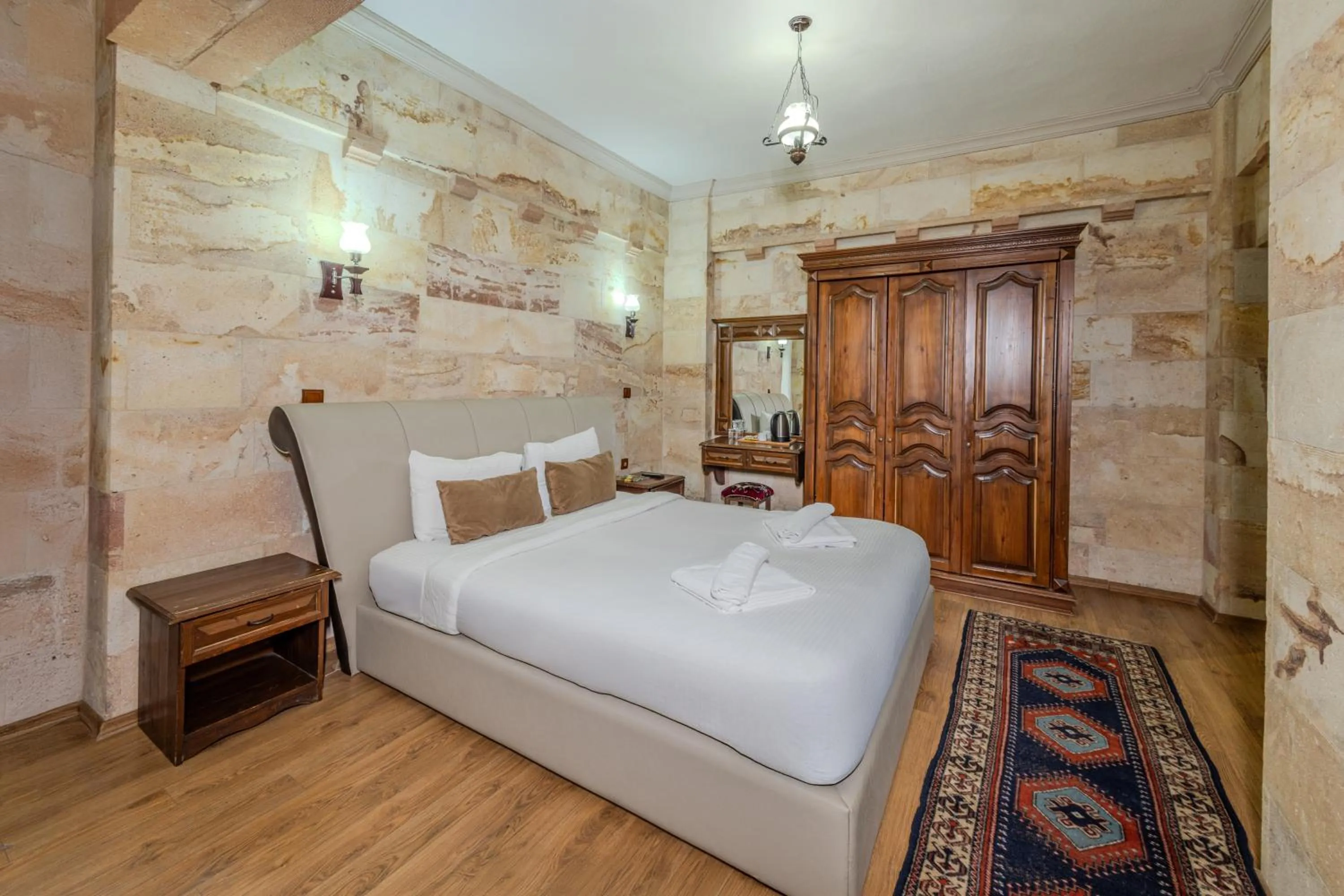 Bed in Akuzun Stone Hotel