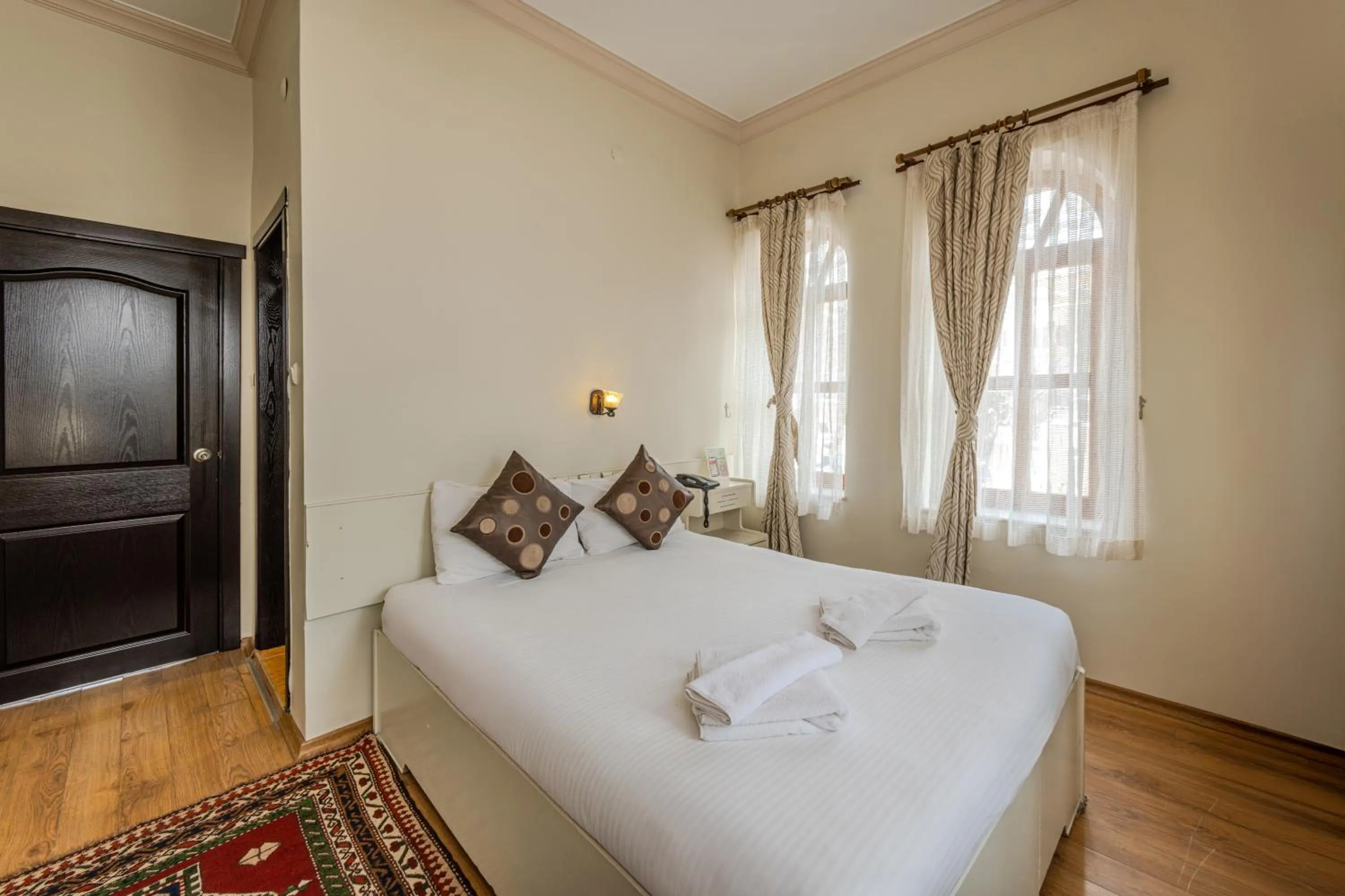 Bed in Akuzun Stone Hotel