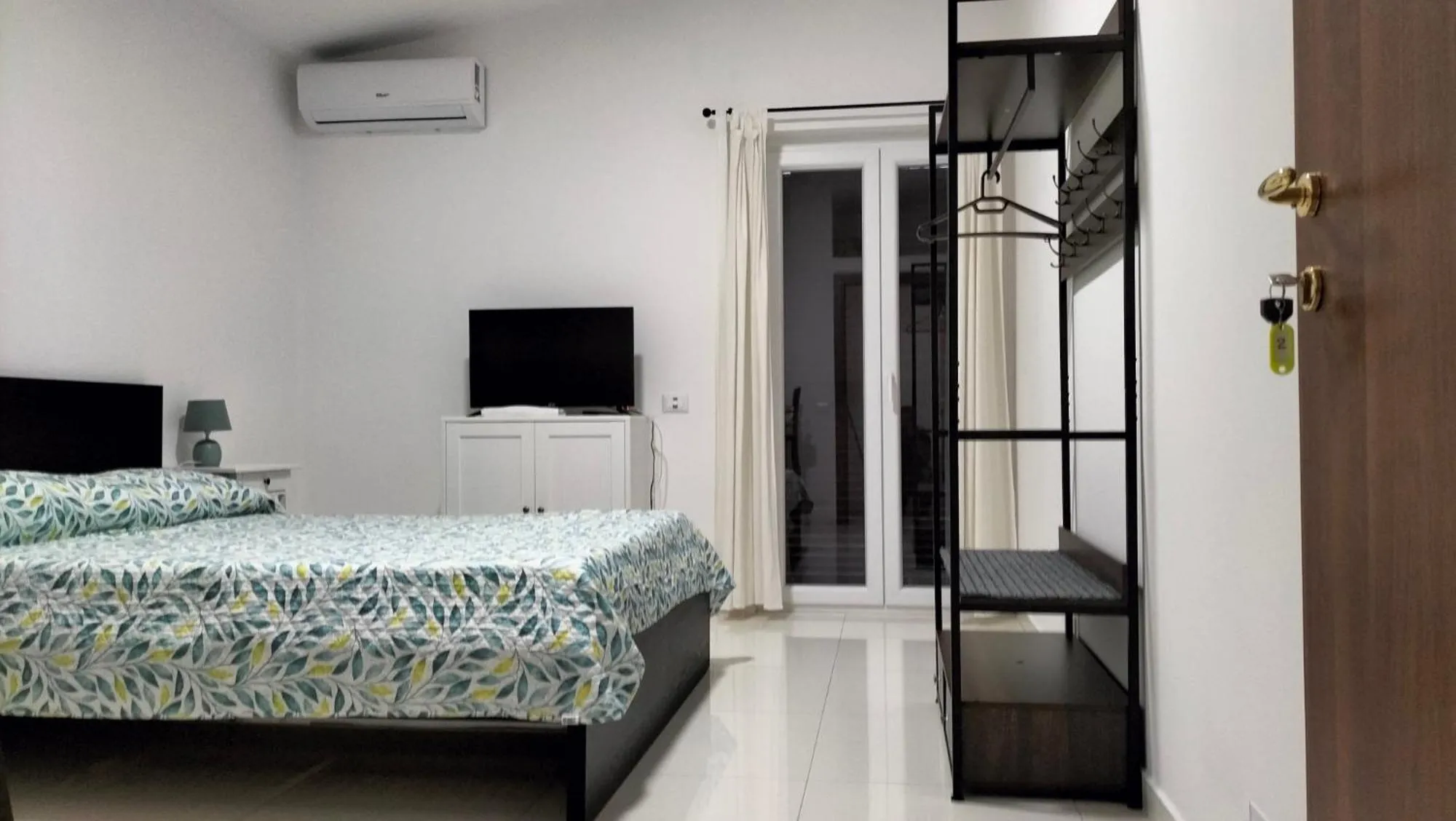 Bed in THE HOUSE FIERA di ROMA AEROPORTO FIUMICINO