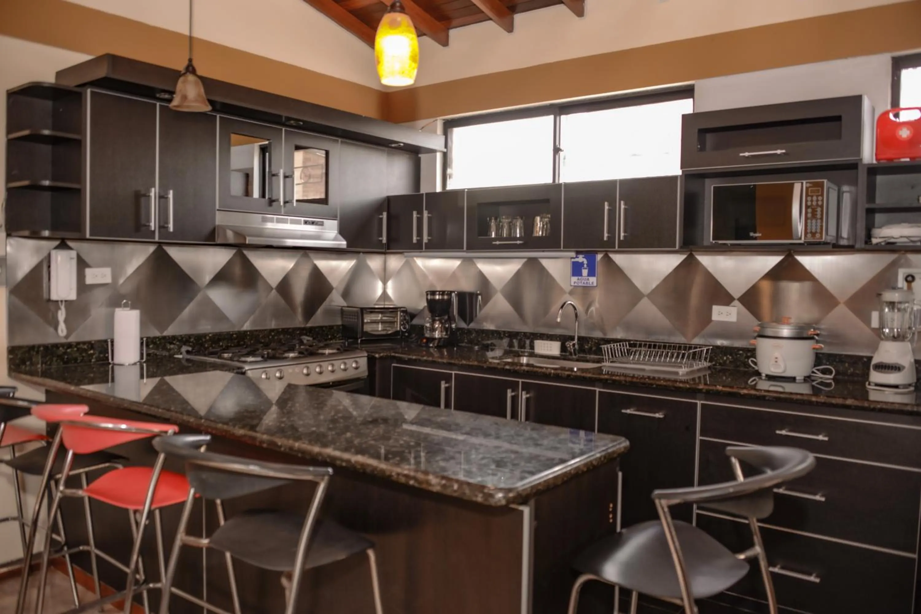 Kitchen or kitchenette in Calle 8 Suites