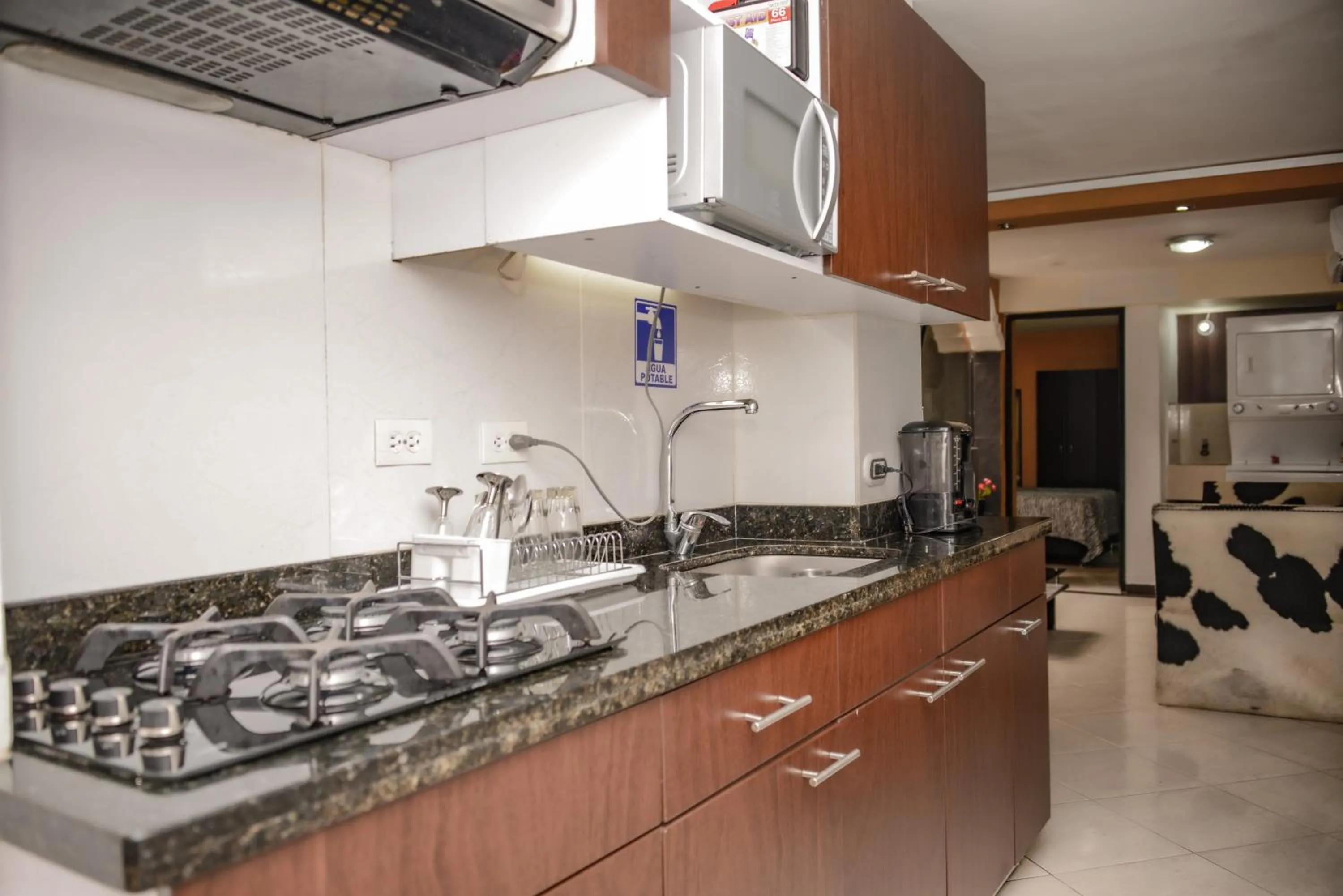 Kitchen or kitchenette in Calle 8 Suites