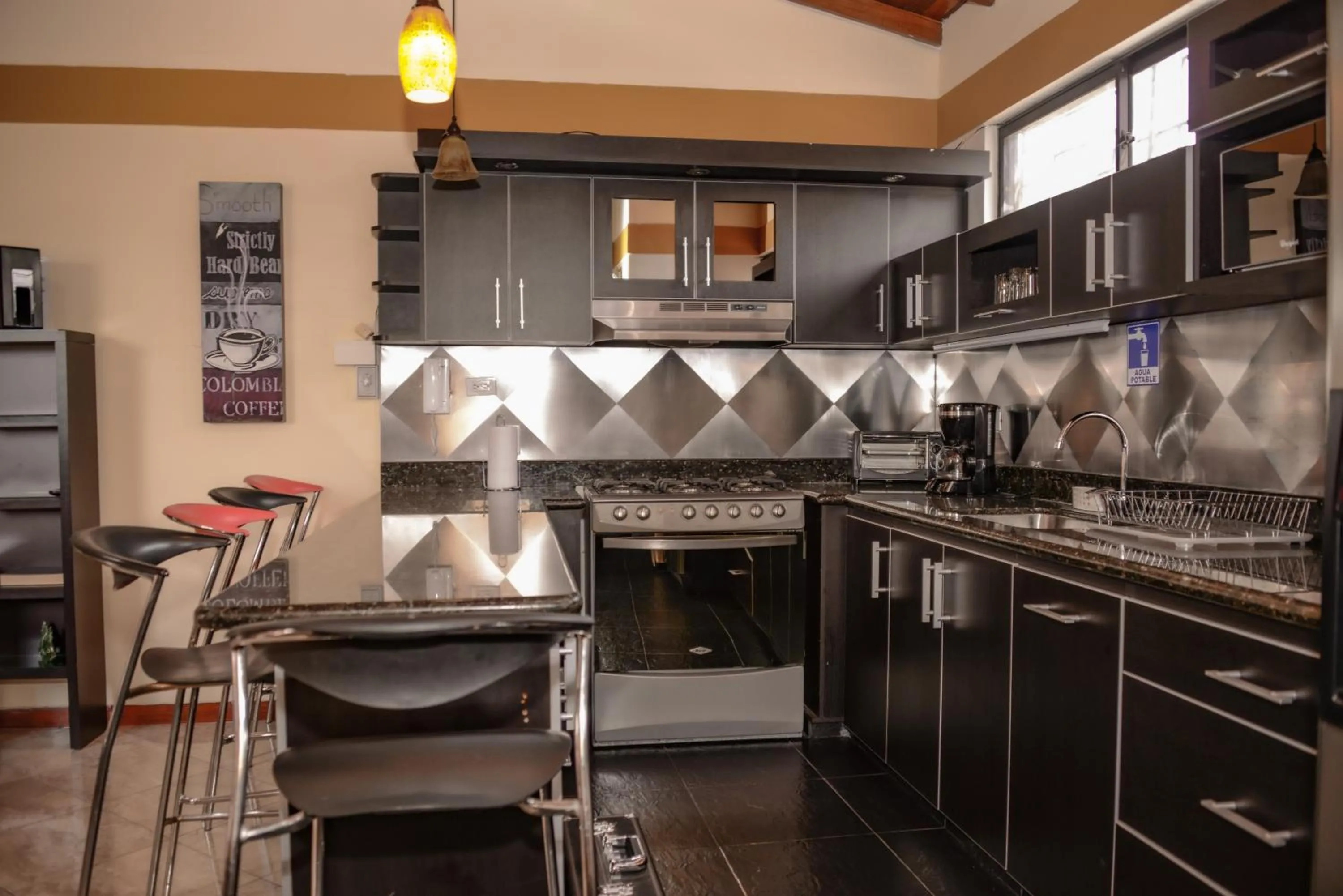 Kitchen or kitchenette in Calle 8 Suites