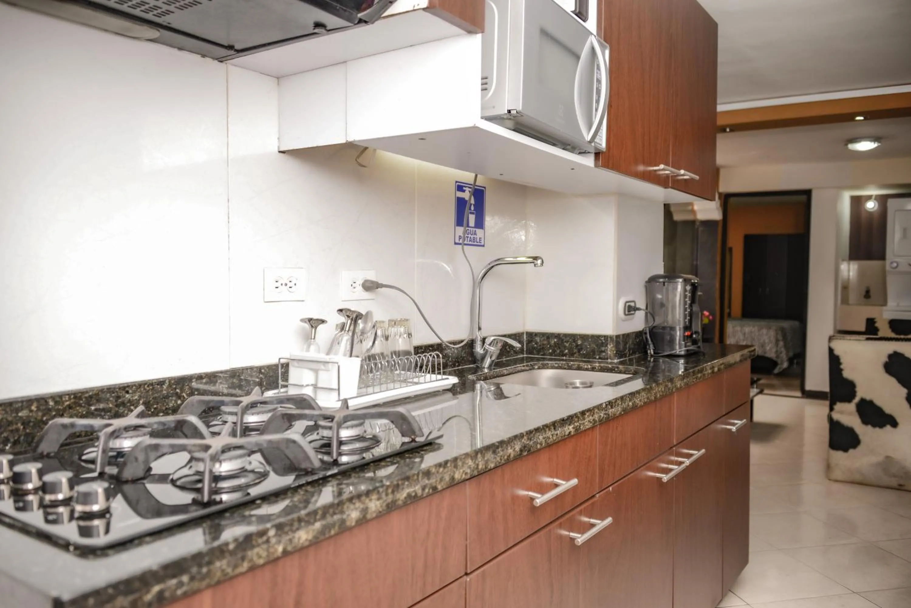 Kitchen or kitchenette in Calle 8 Suites