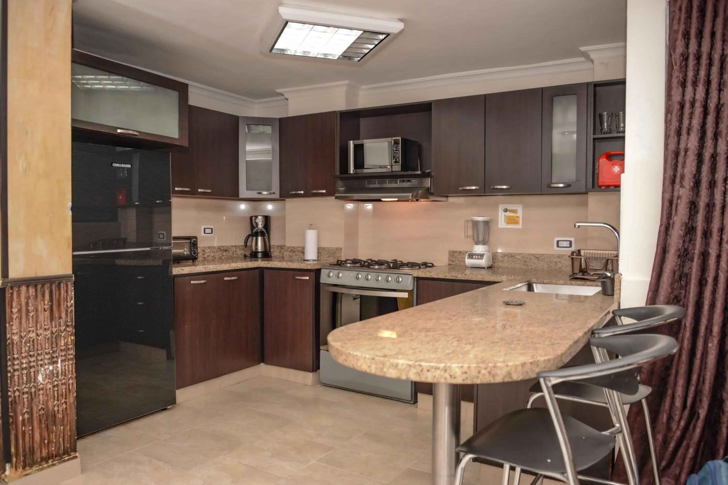 Kitchen or kitchenette in Calle 8 Suites