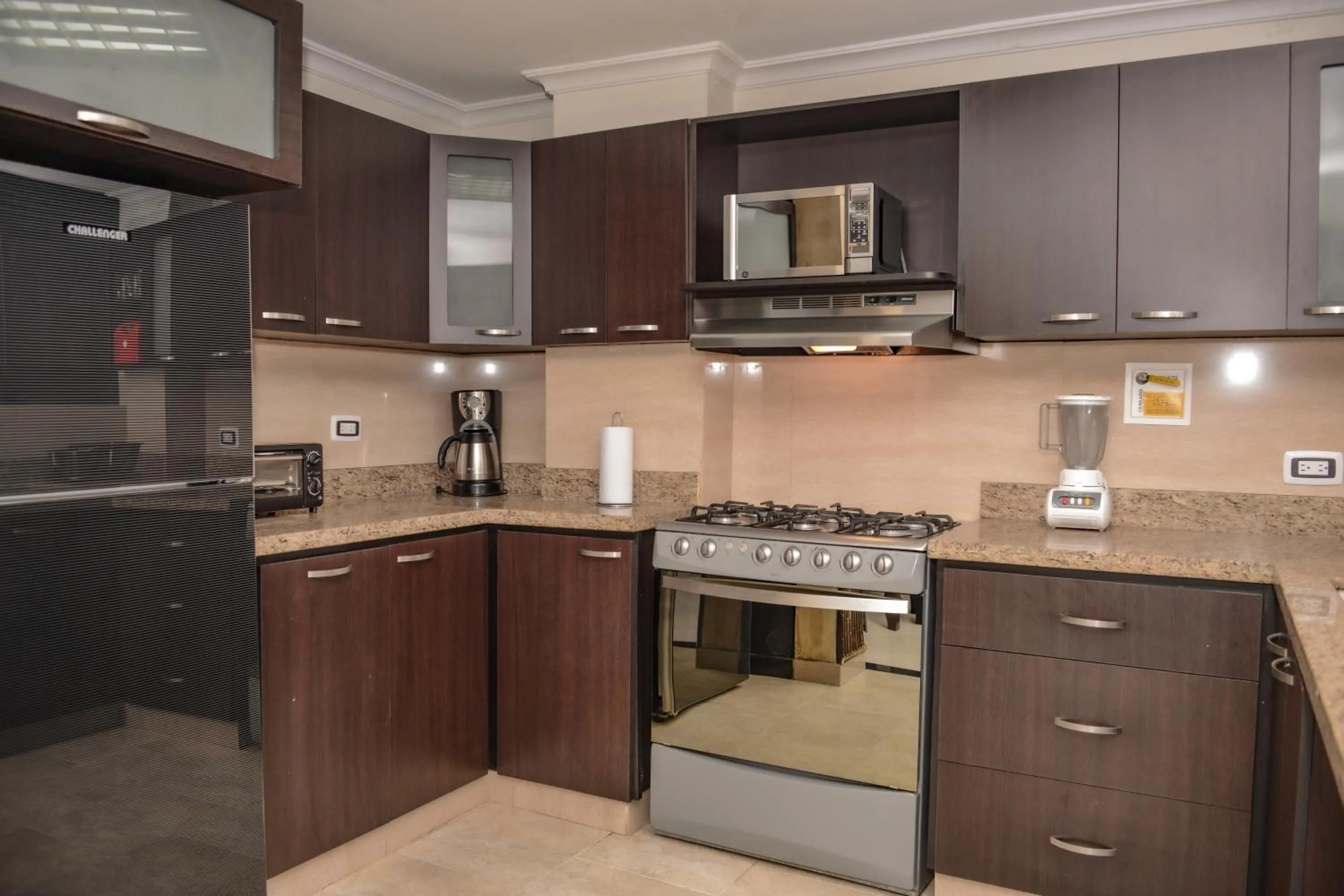 Kitchen or kitchenette in Calle 8 Suites