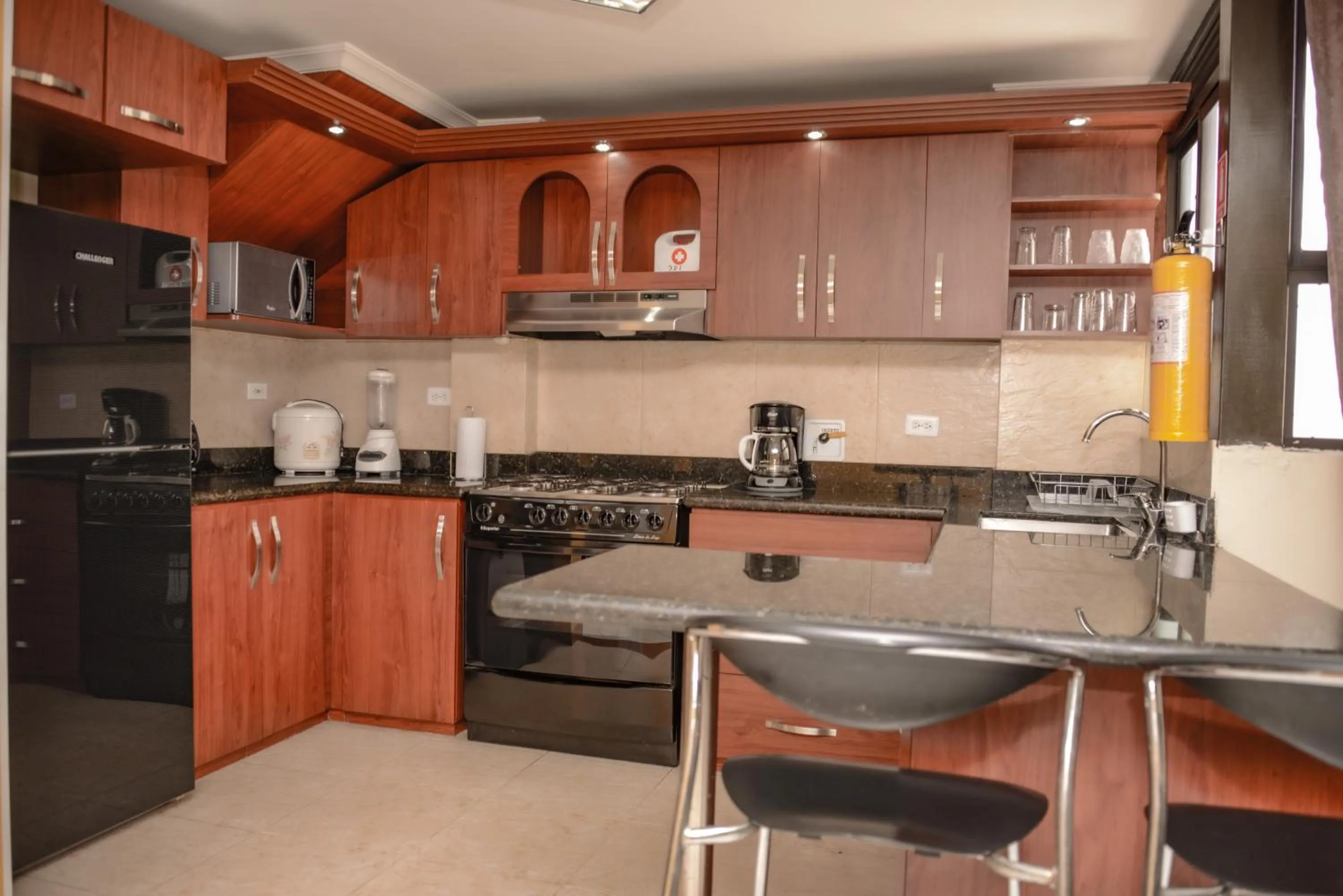 Kitchen or kitchenette in Calle 8 Suites