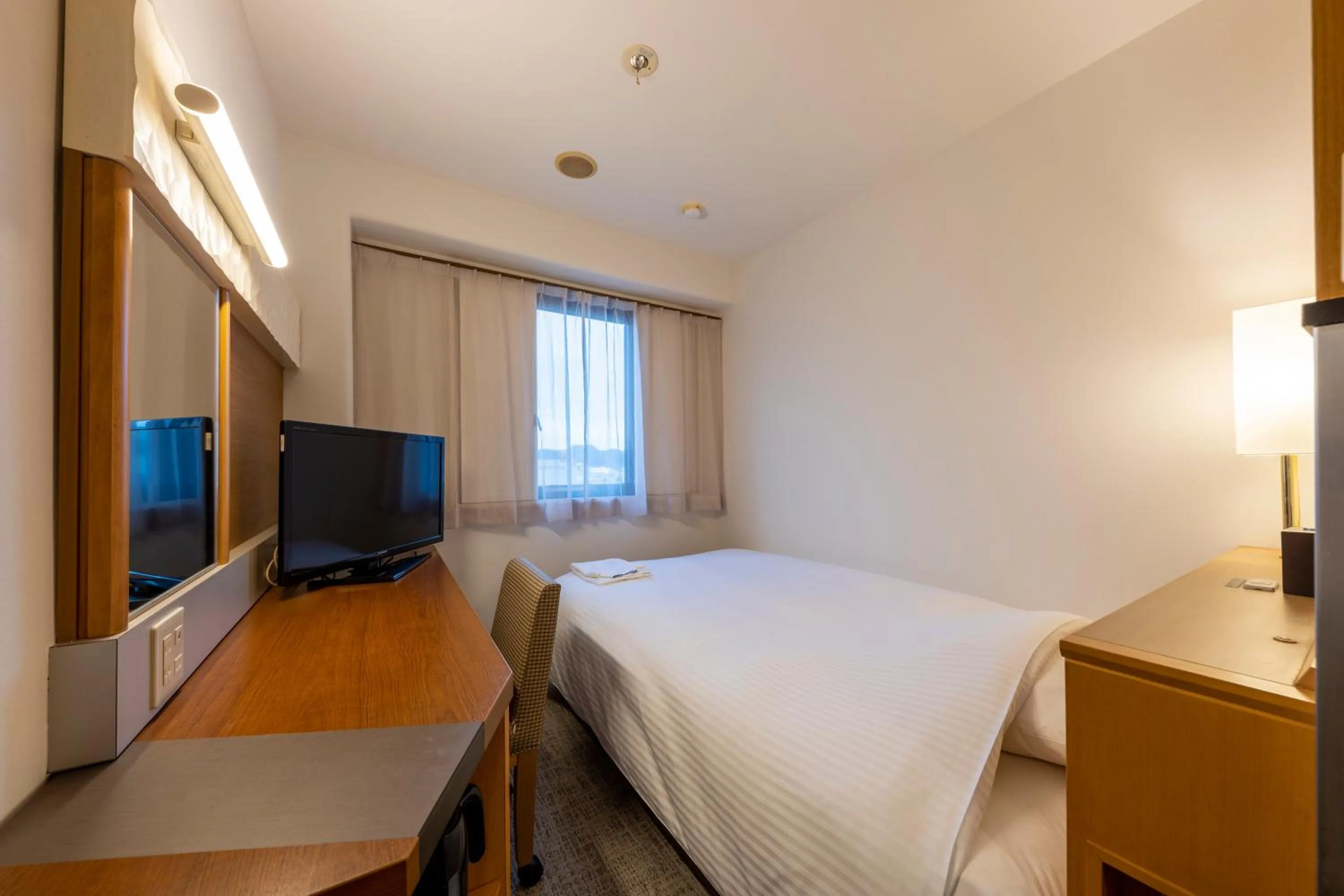 Photo of the whole room, Bed in JR CLEMENT INN HIMEJI