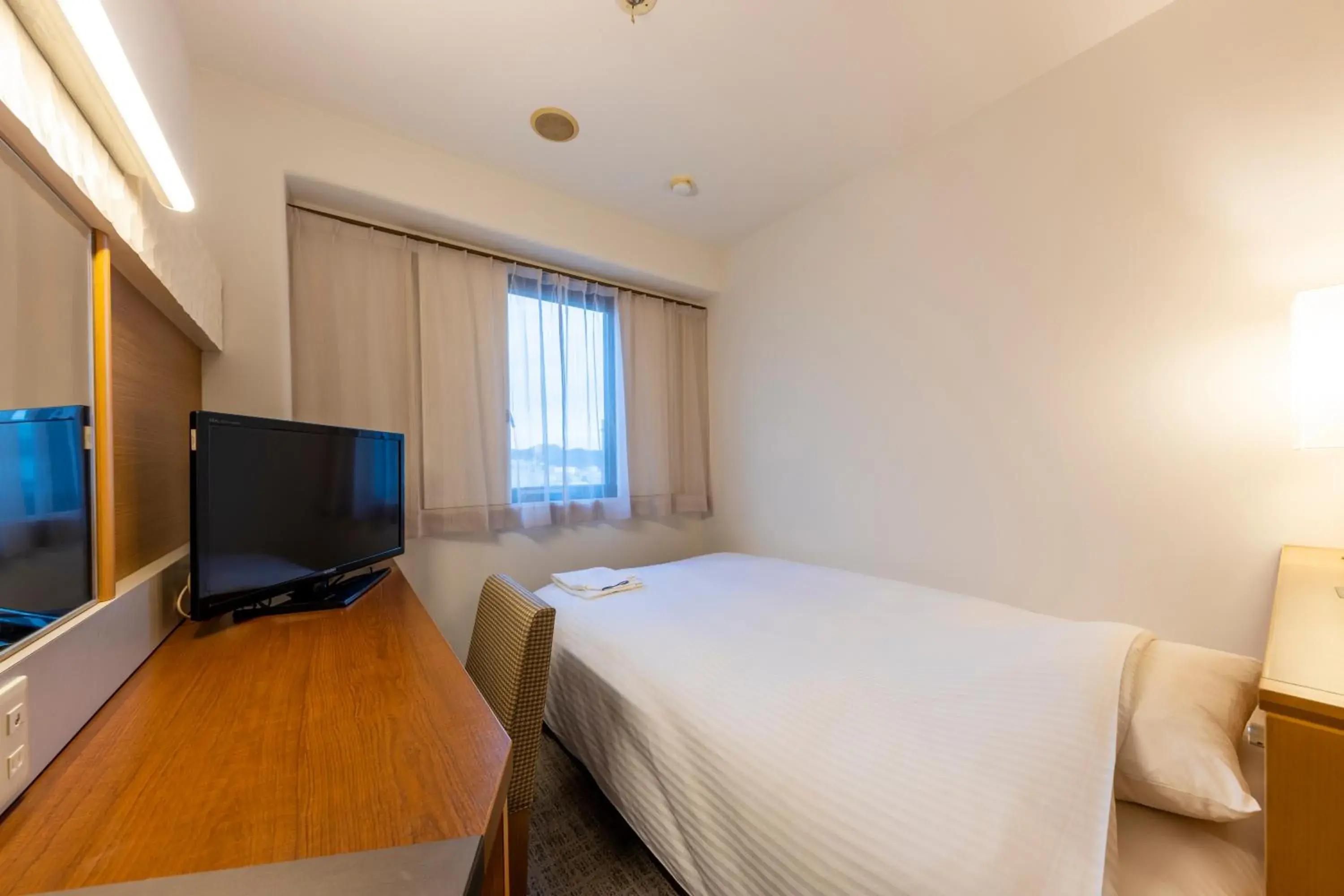 Photo of the whole room, Bed in JR CLEMENT INN HIMEJI Photo of the whole room, Bed in JR CLEMENT INN HIMEJI